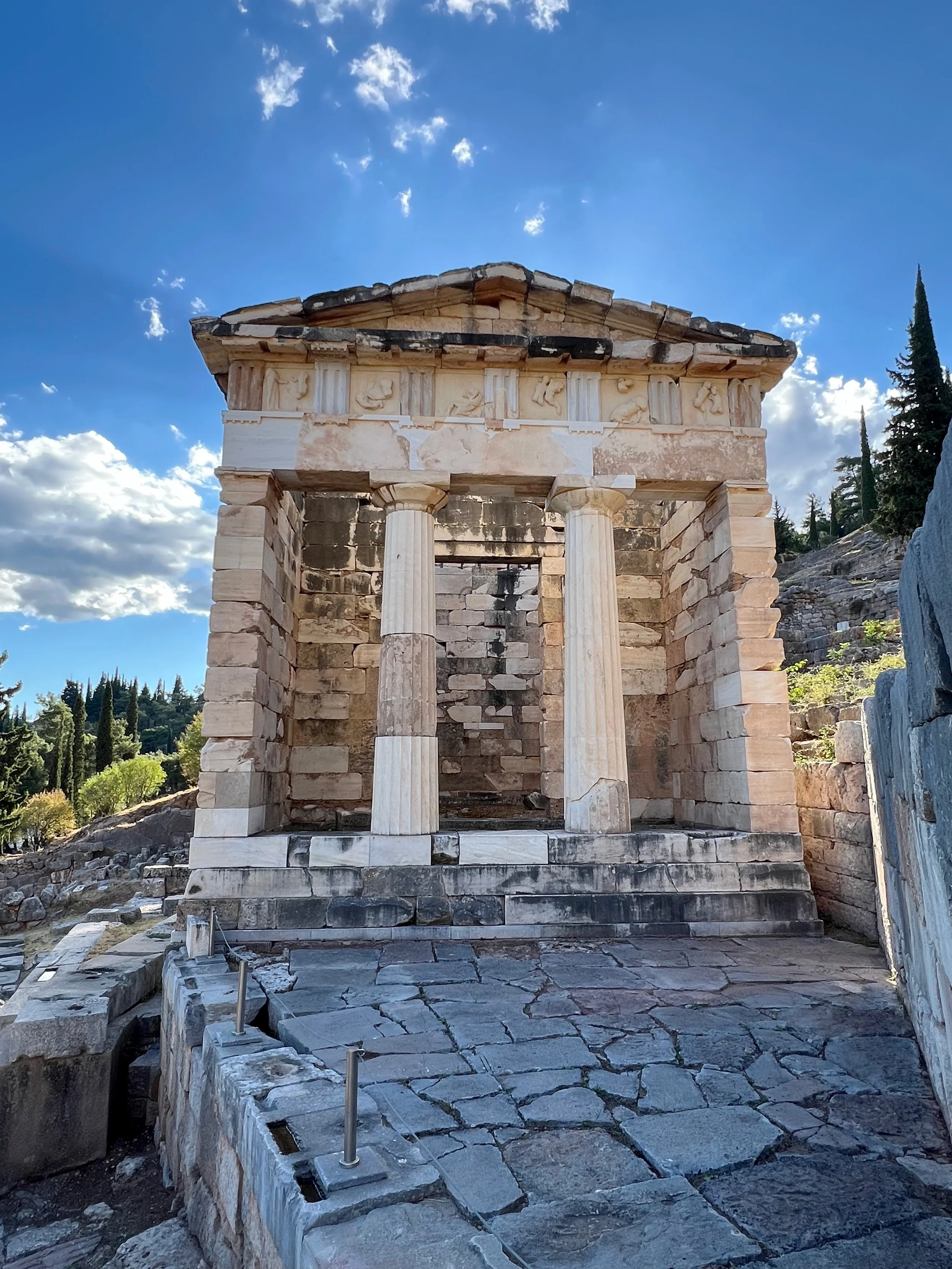 05 · An Open Door to the Sky
Two columns frame a dark doorway beneath carved stone and bright clouds.
2024 · Greece
iPhone 13 Pro Max · 1.6 mm · f/1.8 · 1/499 s · ISO 32