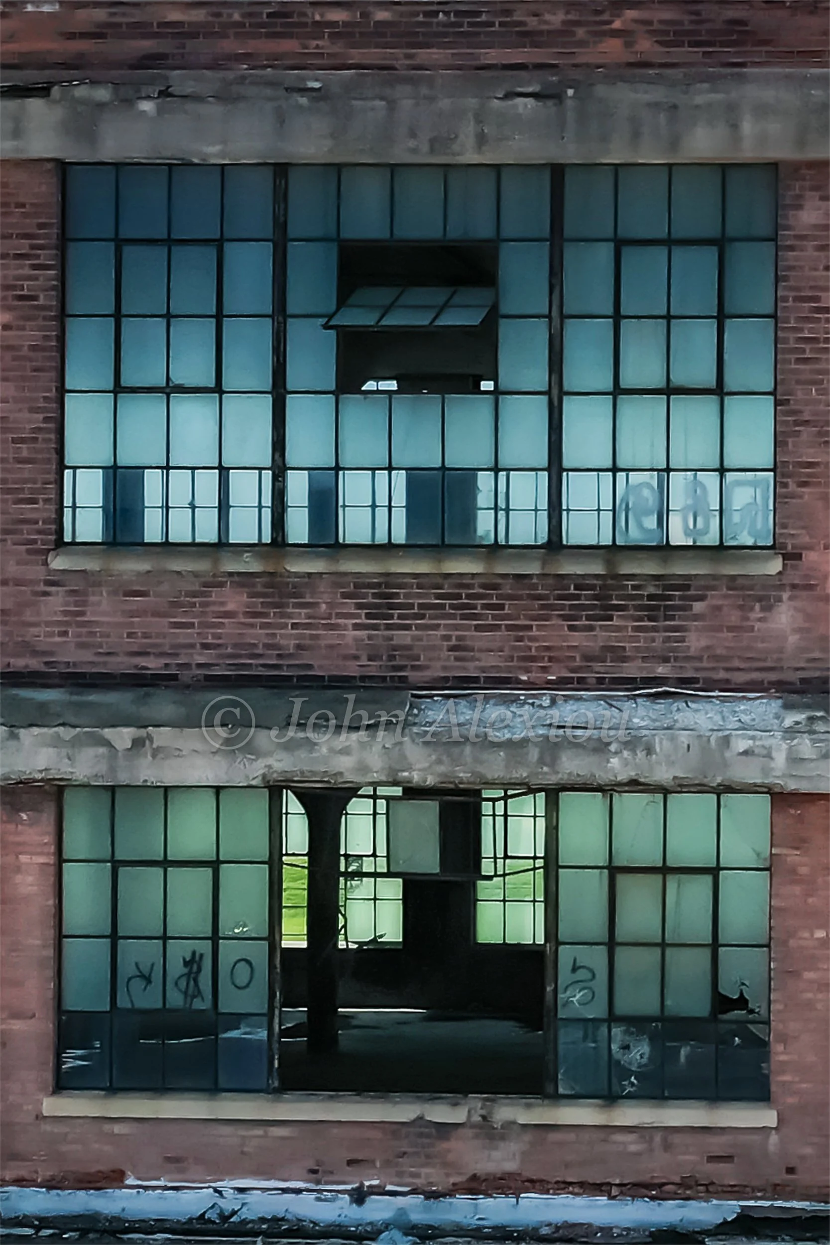 03 · One Above the Other
An open doorway and a tilted window break the pattern of two stacked window grids.
© John Alexiou · 2019 · Scranton Lace Company