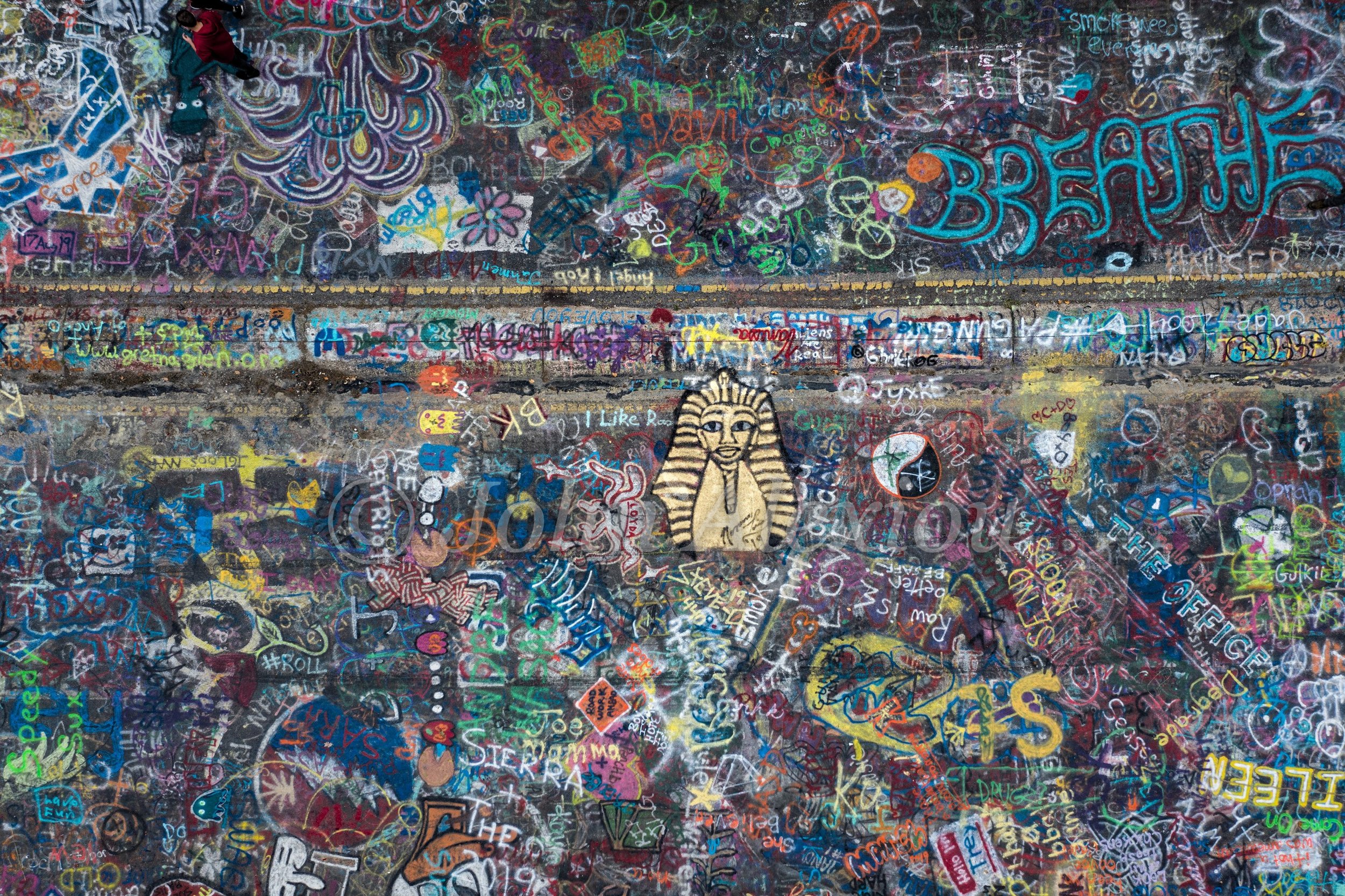 08 · Faces and Messages: A gold pharaoh mural, turquoise lettering and overlapping drawings on Graffiti Highway, Centralia, Pennsylvania, 2019. Reviewed presentation version.

© John Alexiou · 2019 · Centralia