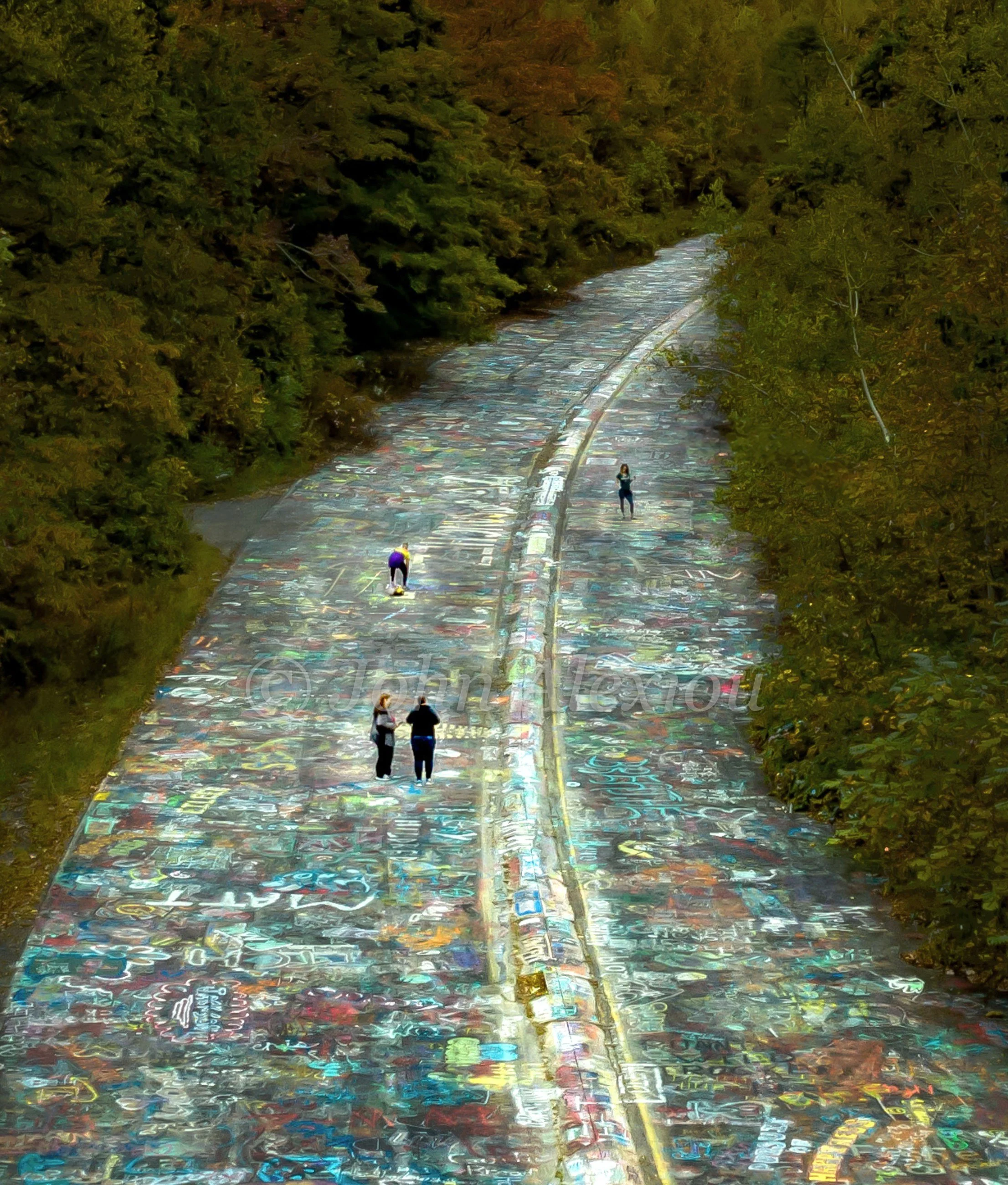 01 · Into the Forest: Visitors on the painted curve of Graffiti Highway, Centralia, Pennsylvania, 2019.

© John Alexiou · 2019 · Centralia