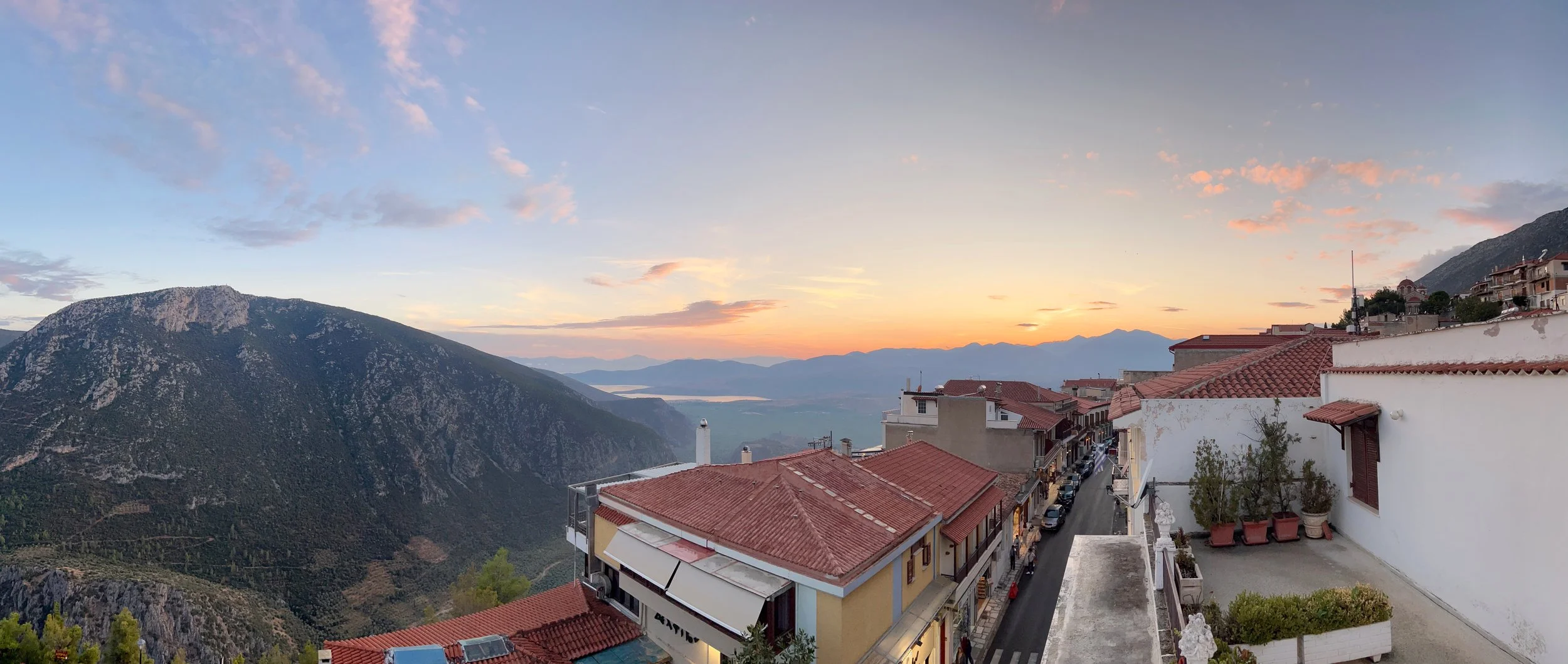 12 · The Last Light Beyond the Roofs
Warm sunset light rests above layered mountains and a line of red-tiled roofs.
2024 · Greece
iPhone 13 Pro Max · 5.7 mm · f/1.5 · 1/666 s · ISO 125