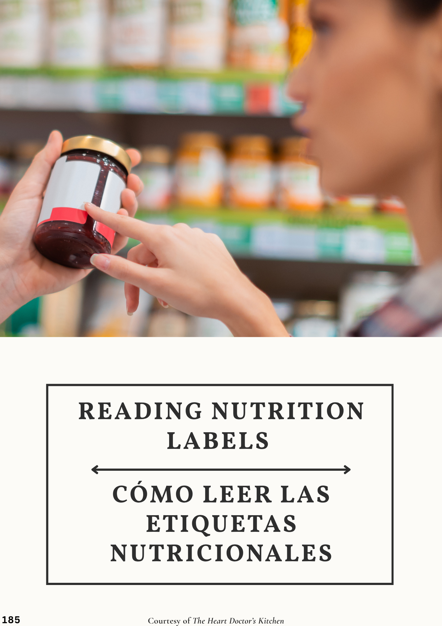 A person at a grocery store reading a nutrition label on a jar while pointing at it, with shelves of various products in the background.