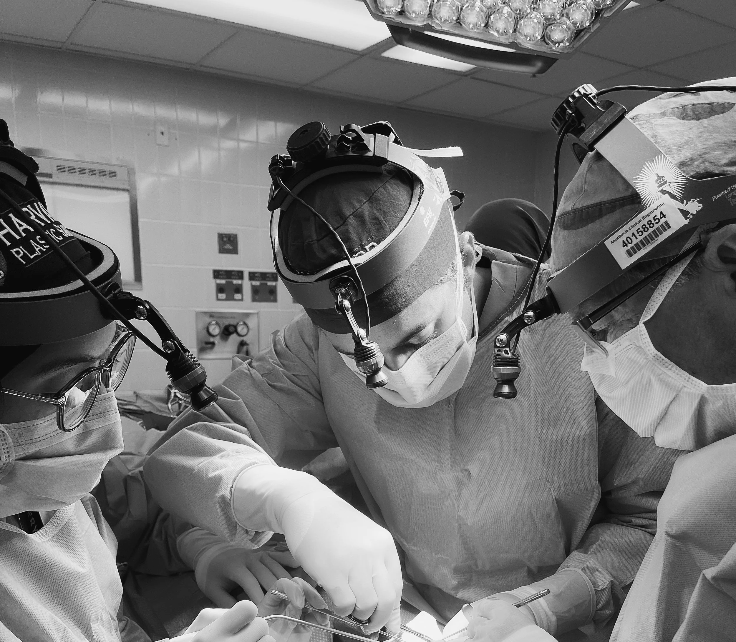 Dr. Elie Ramly and his surgical ream operating on a a patient.
