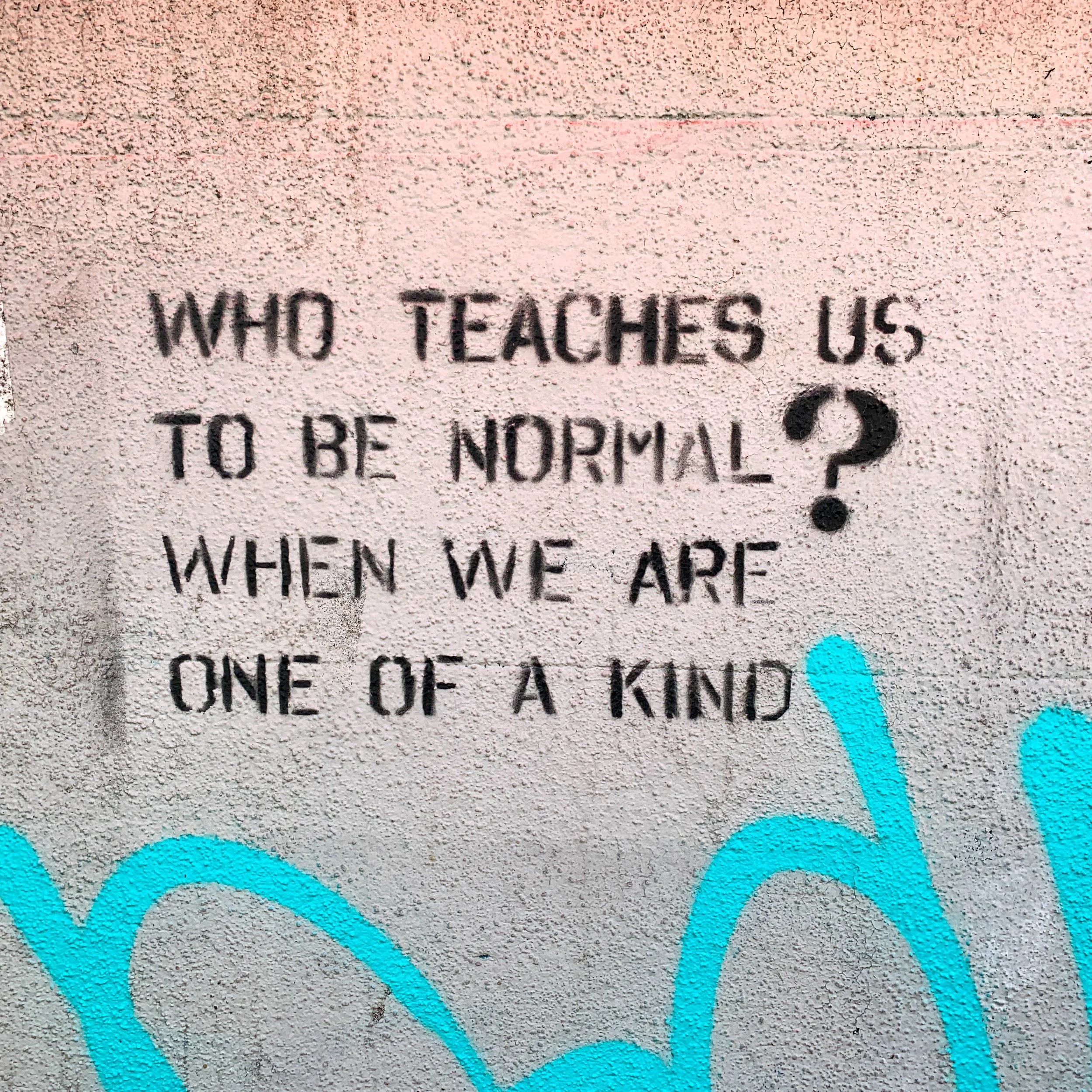 Street art in Brighton. Who teaches us to be normal? when we are one of a kind.