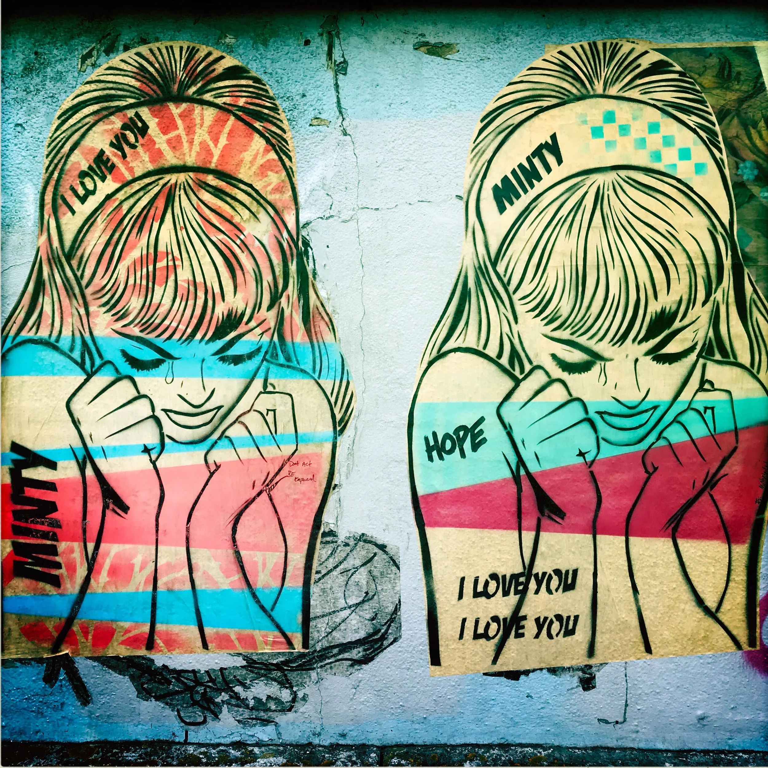 Street art in Brighton. Two images of a young woman. I Love You. Minty.