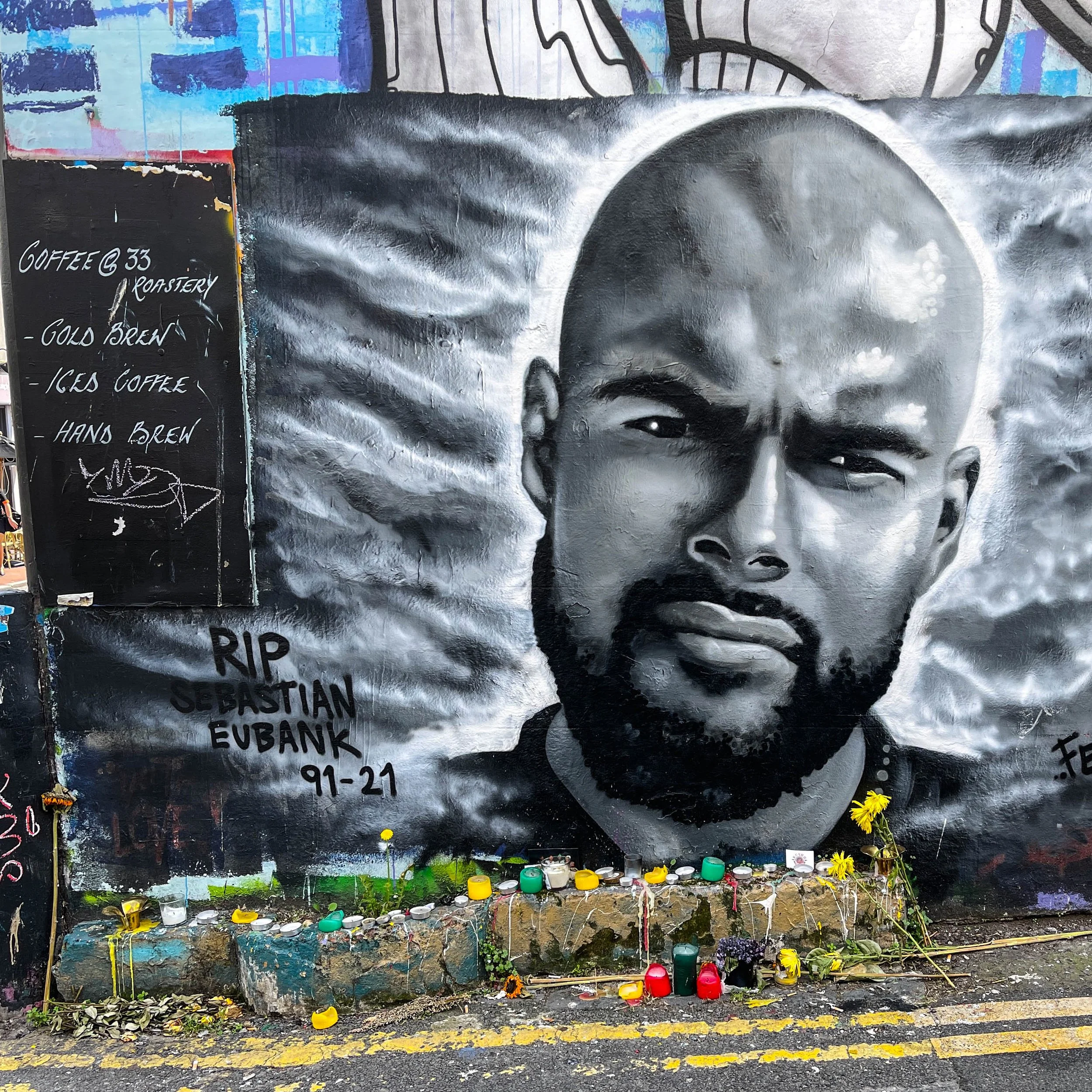 Street art in Brighton. Black and white image of Sebastian Eubank.
