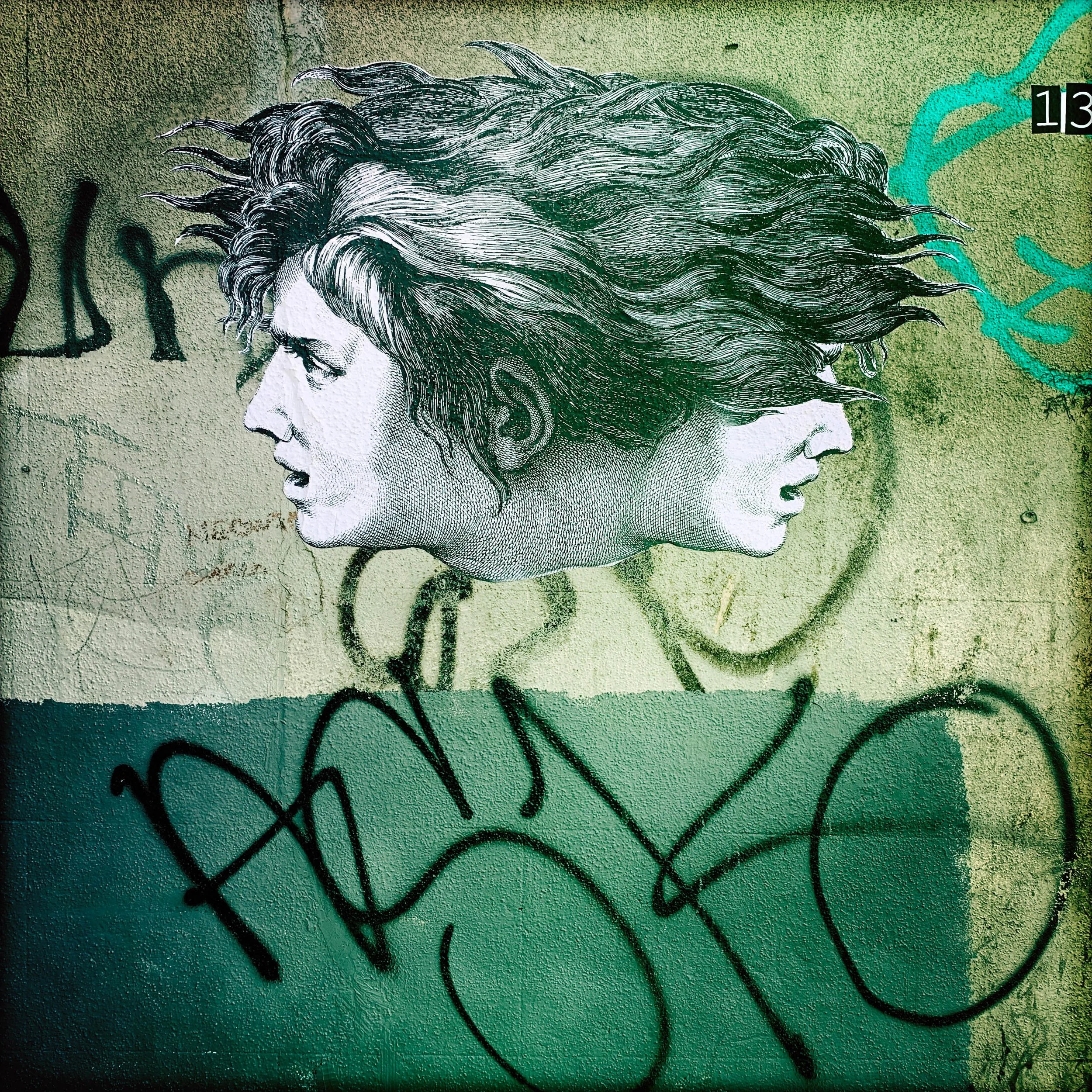 Street art in Brighton. Two heads.
