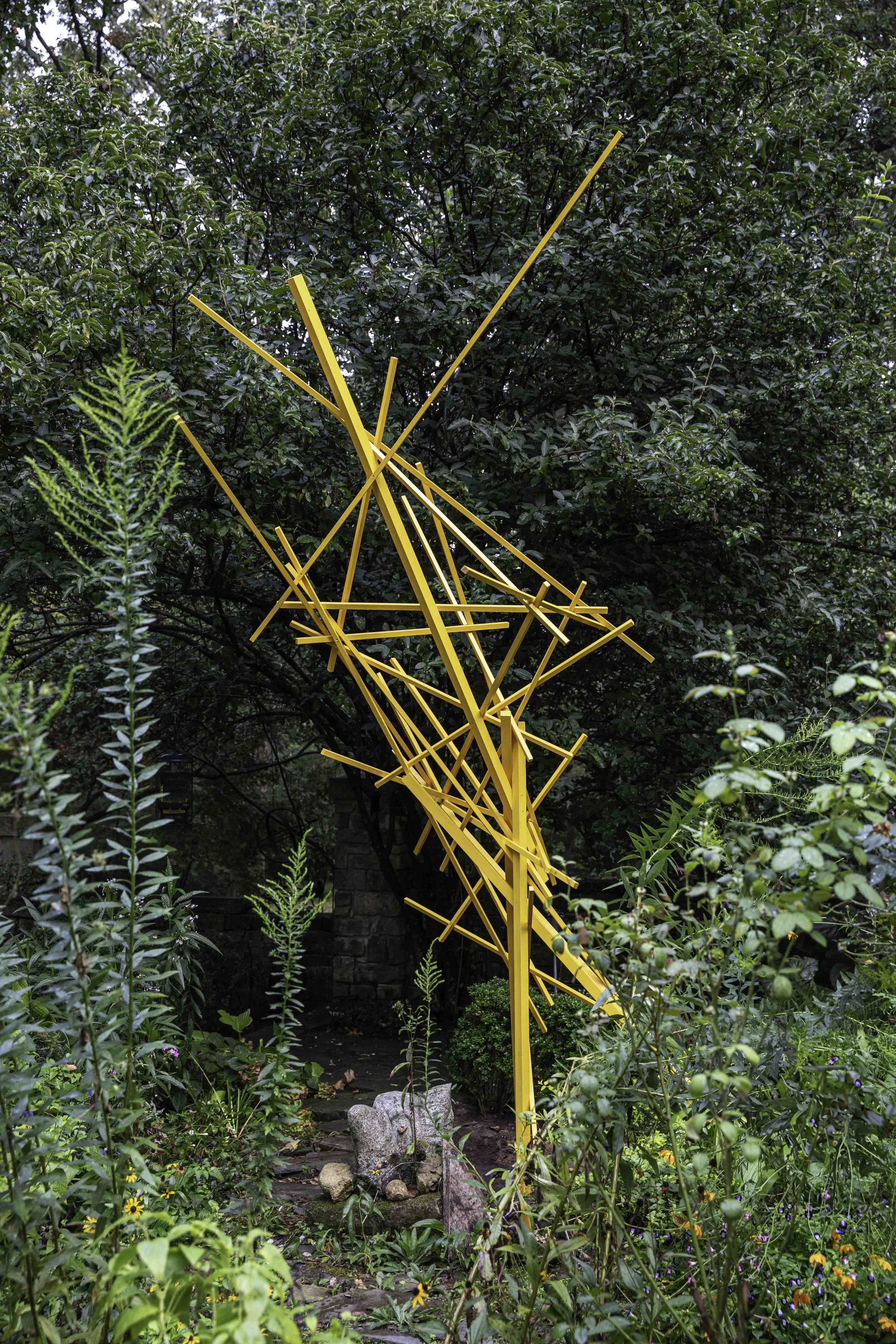Buttercup Boogie (Dancing Between Order and Chaos); painted cedar, approx. 168" x 60" x 60"