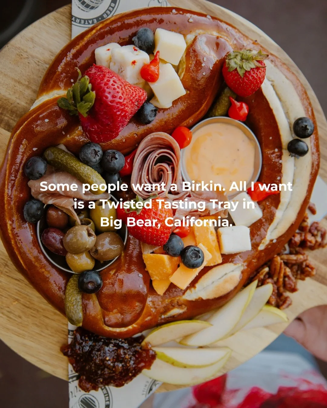 Different kind of luxury. Same level of obsession. 🤤

Curated meats + assorted cheeses + fresh fruit + olives + cornichons + sweet peppers + fig jam&hellip; all stuffed into our warm, giant, soft pretzel. 

We&rsquo;ll take ours warm, stuffed, and s