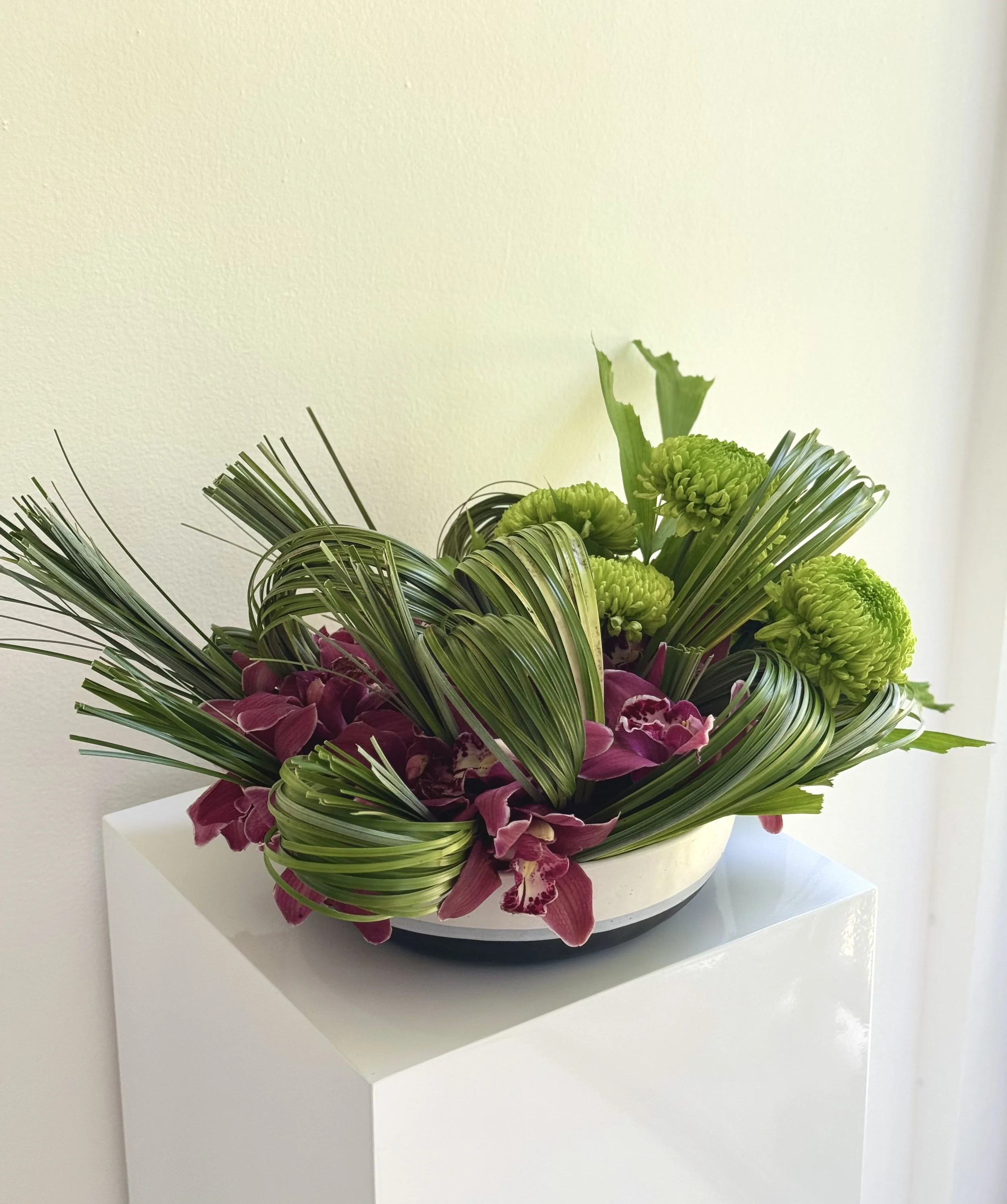  Constructed bouquet with bear grass and orchids 