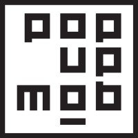 Abstract black and white geometric pattern resembling a symmetrical mosaic.