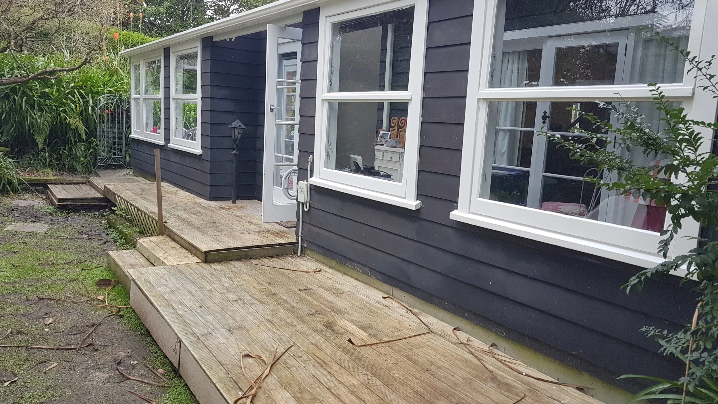 Window repainting with Dulux 1st step primer and Dulux Enamel semi-gloss. Pressure washing of home and decking area & front of garage.