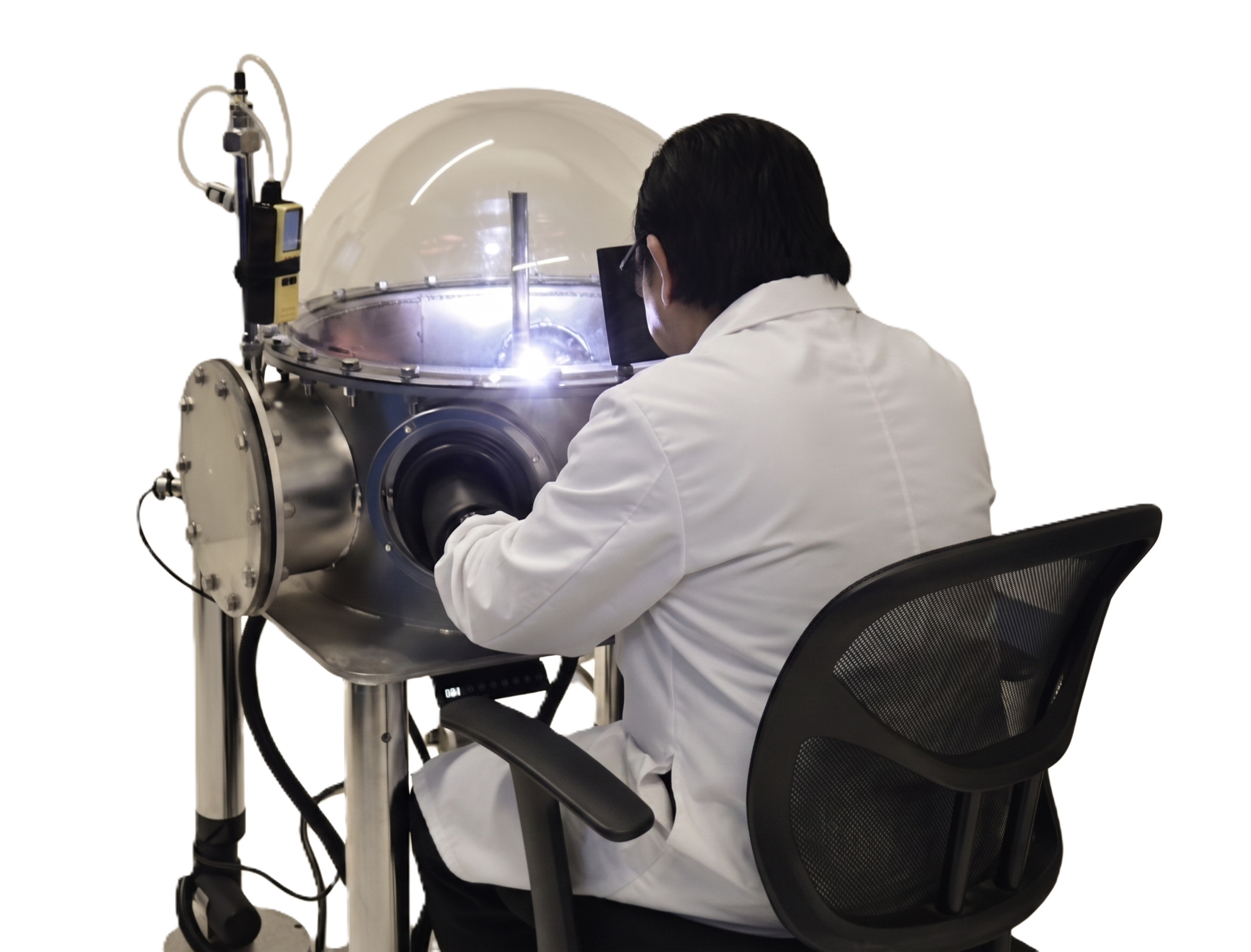 Rick Montoya operating the TRON E-24 Argon Weldstation at Spacetron Titanium Chambers Co., Valencia CA