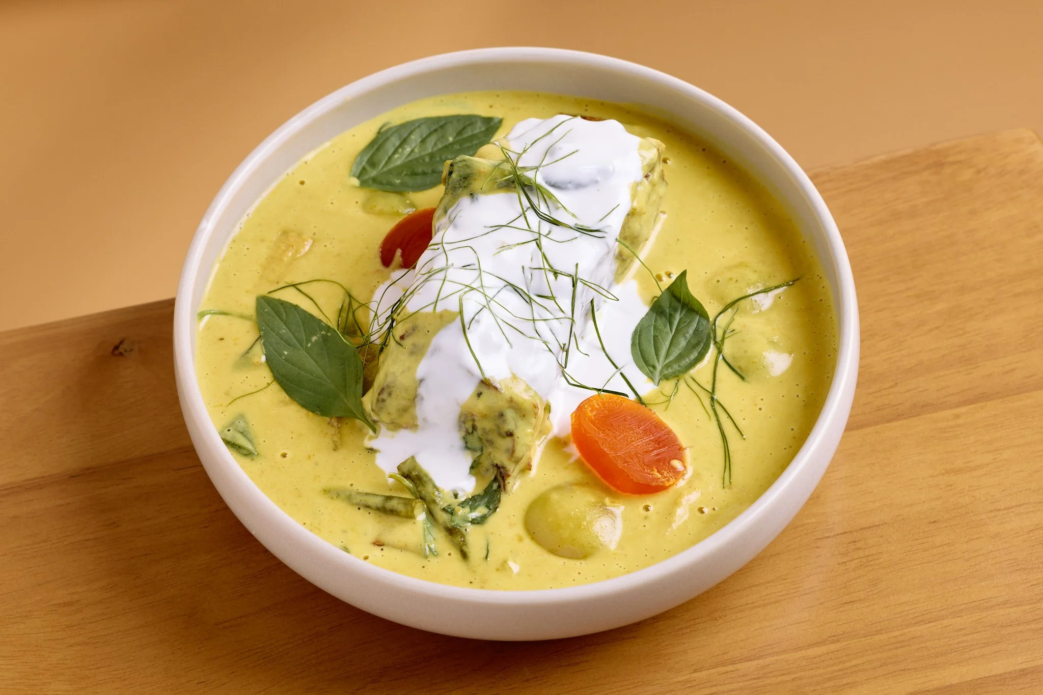  Modern Asian fusion dishes like creamy green curry with seafood 