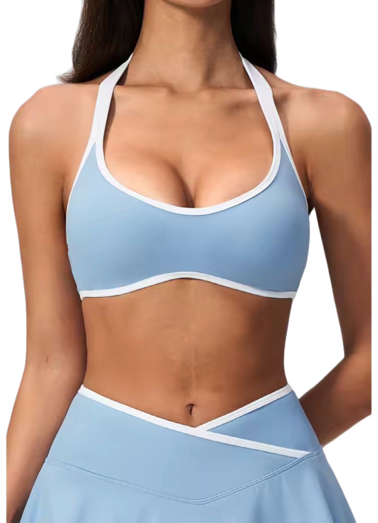 Close-up of a woman in a light blue sports bra and matching leggings, showing her upper body and torso.