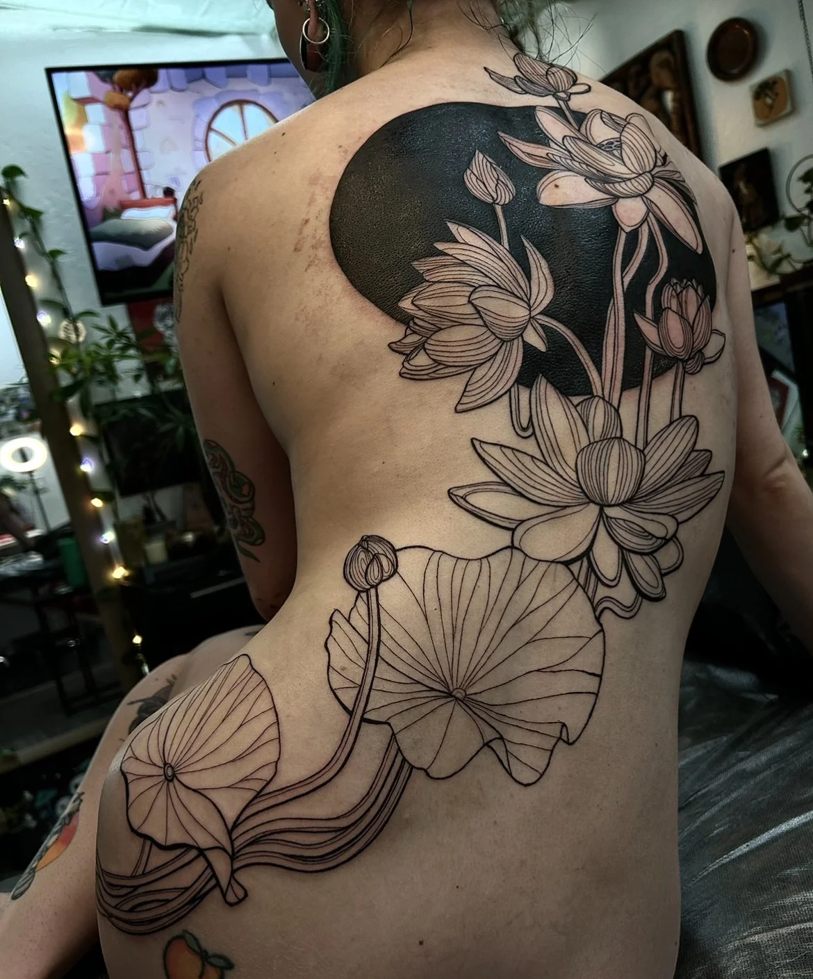 Lotus tattoo by Arville Persons