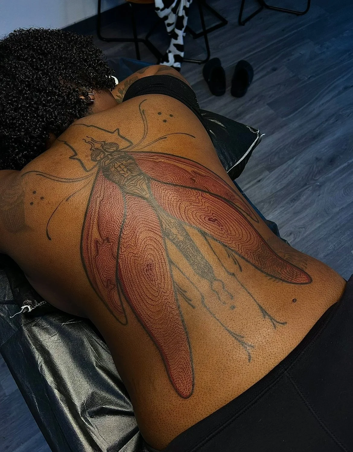Dragonfly tattoo by Arville Persons