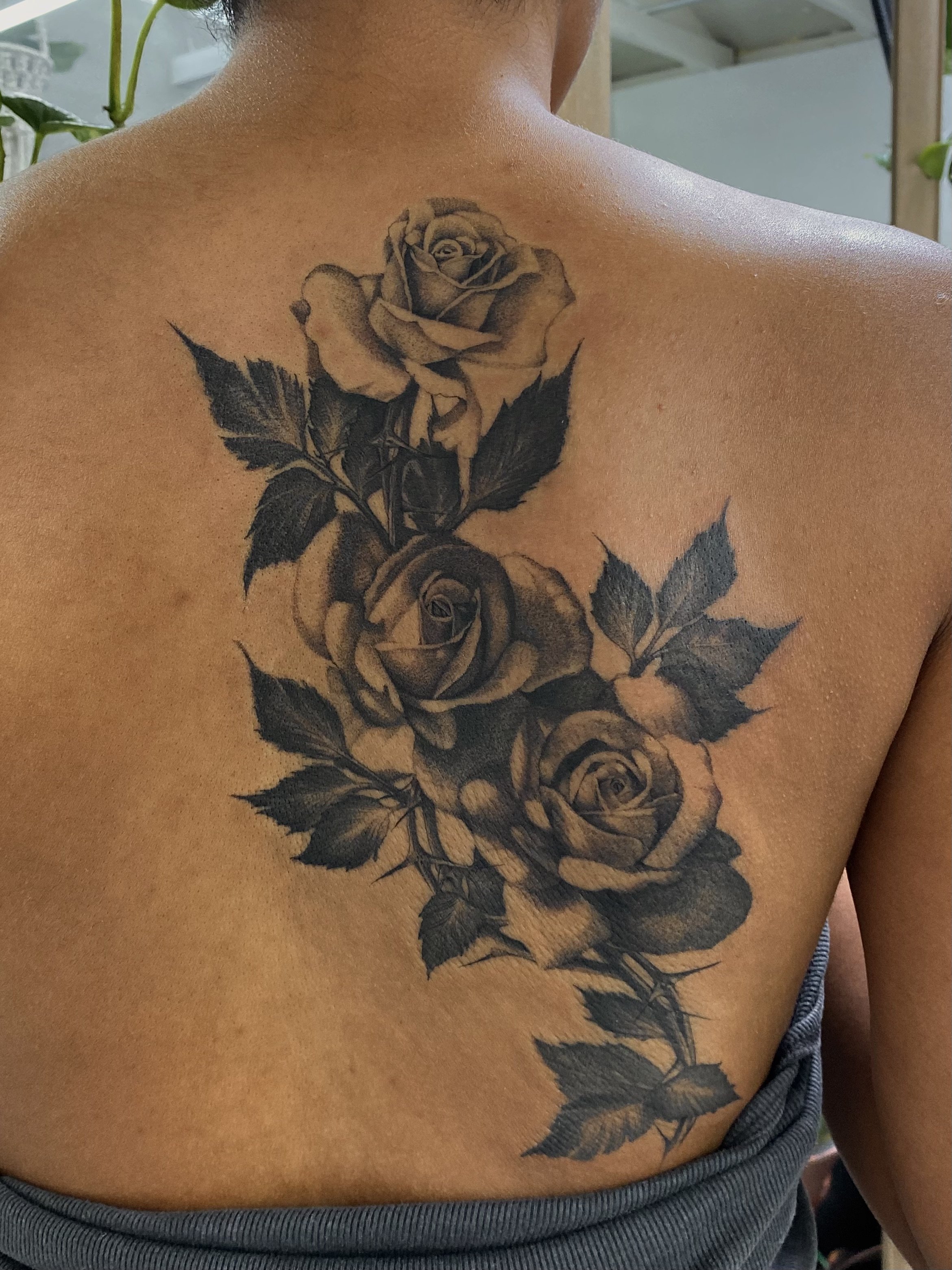 Rose tattoo by Arville Persons