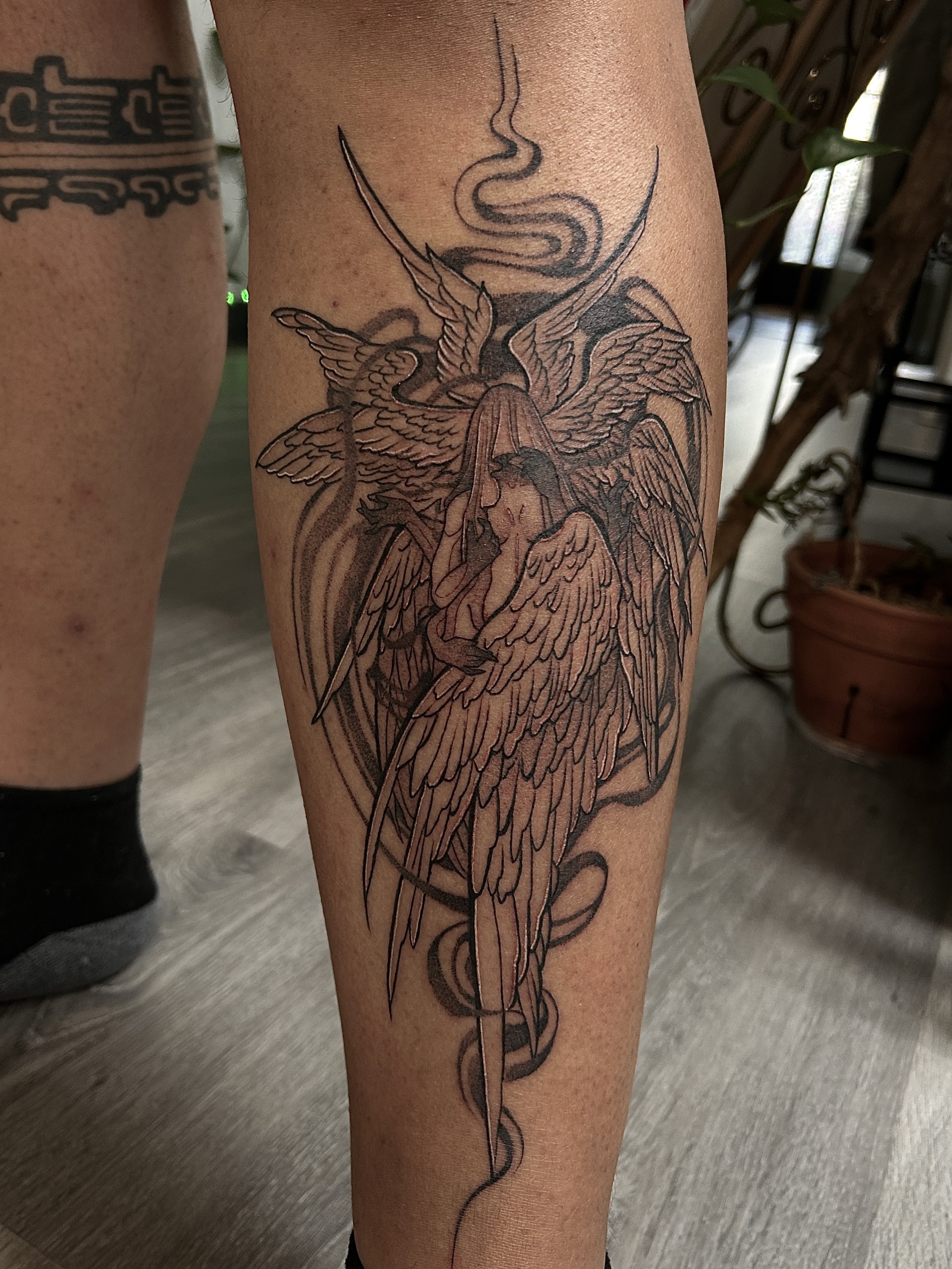Biblically accurate angel tattoo by Arville Persons