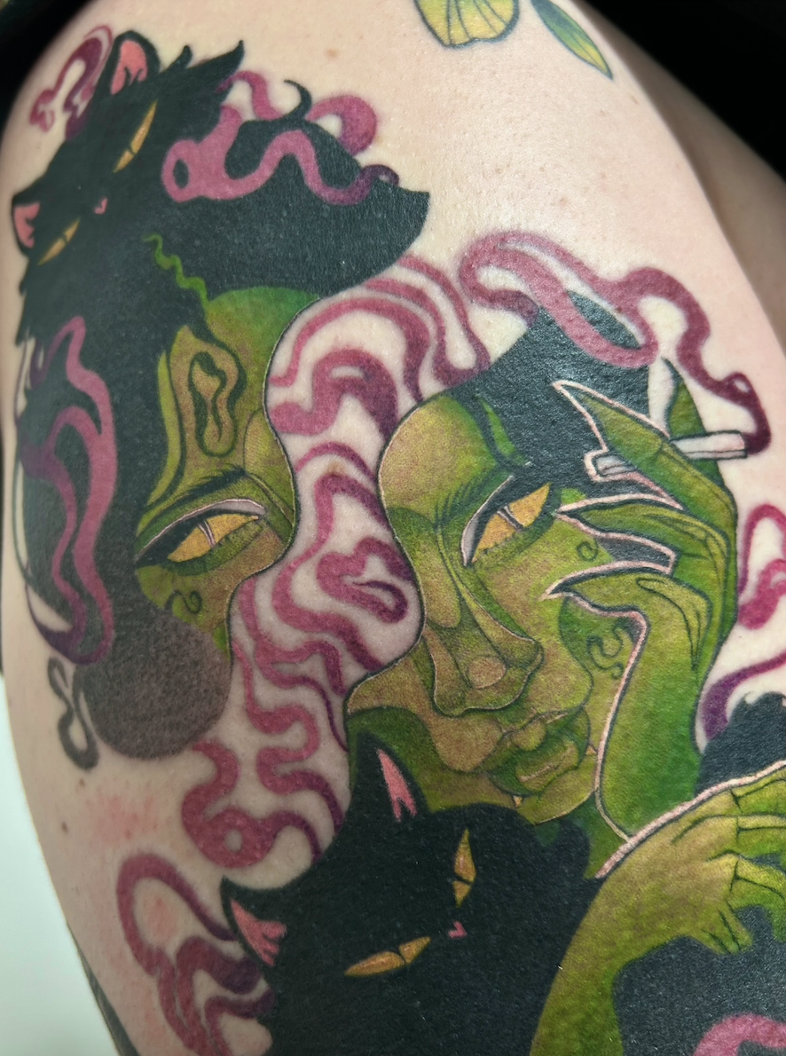 Cat woman tattoo by Arville Persons