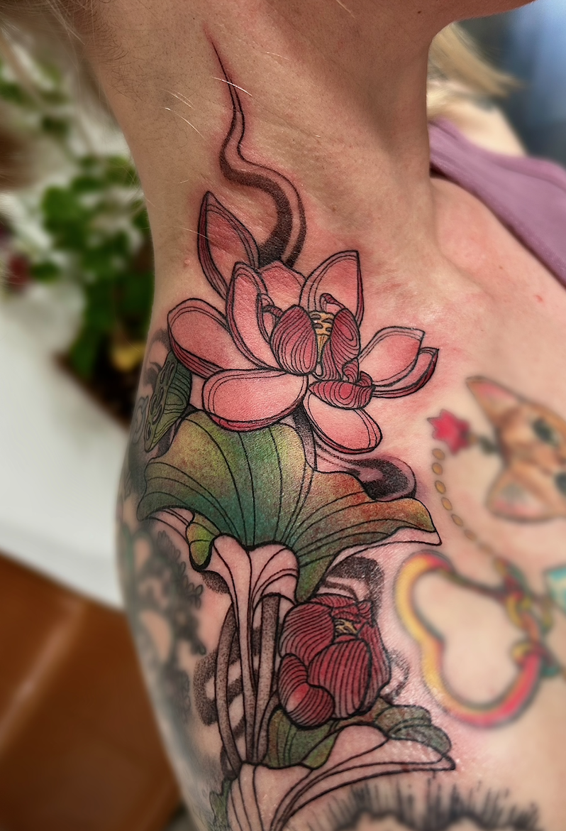 Lotus tattoo by Arville Persons