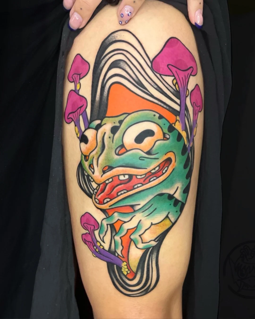 Neo-Traditional frog tattoo created in West Palm Beach, Florida. This custom tattoo features a stylized frog with expressive details, bold linework, and rich color saturation, blending traditional tattoo foundations with a modern illustrative approac