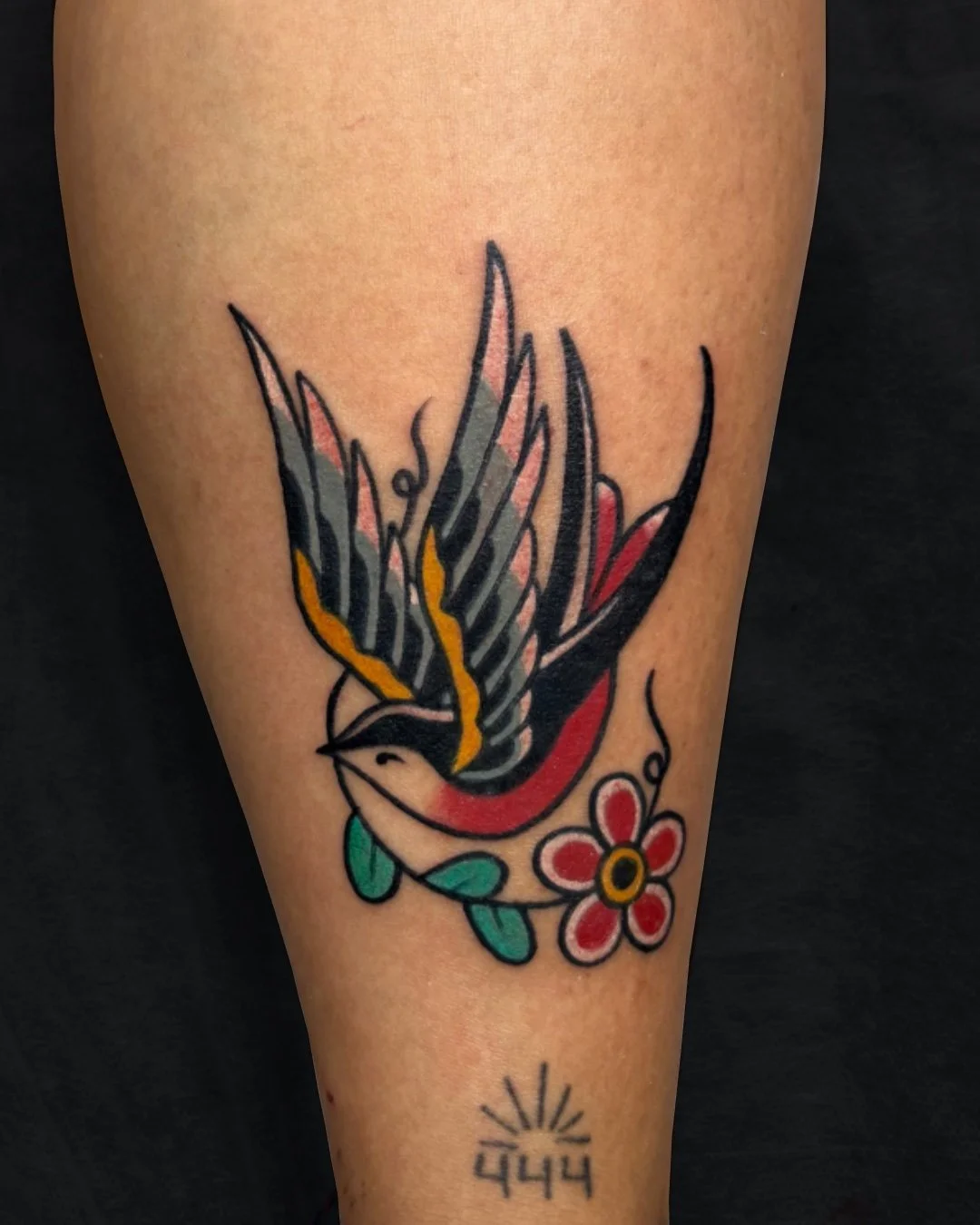 American traditional cartoon tattoo done in West Palm Beach, Florida. This custom tattoo features a playful heart and brain design with expressive faces, bold outlines, strong contrast, and vibrant colors true to classic American traditional tattoo s