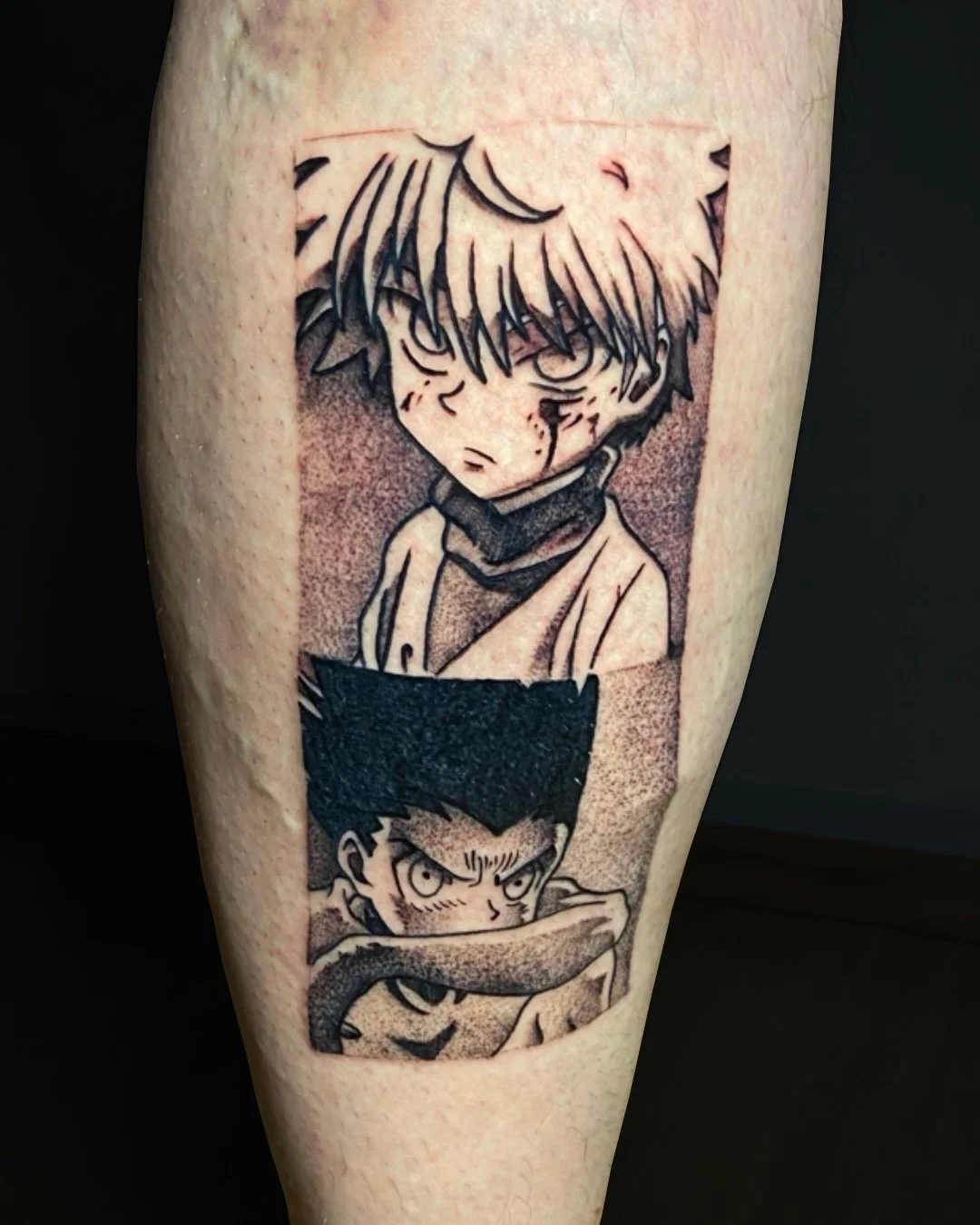 Anime tattoo inspired by Hunter x Hunter featuring Killua Zoldyck and Gon Freecss, tattooed in West Palm Beach, Florida. This custom black and grey anime tattoo captures the contrast between Killua’s calm intensity and Gon’s determination, using clea