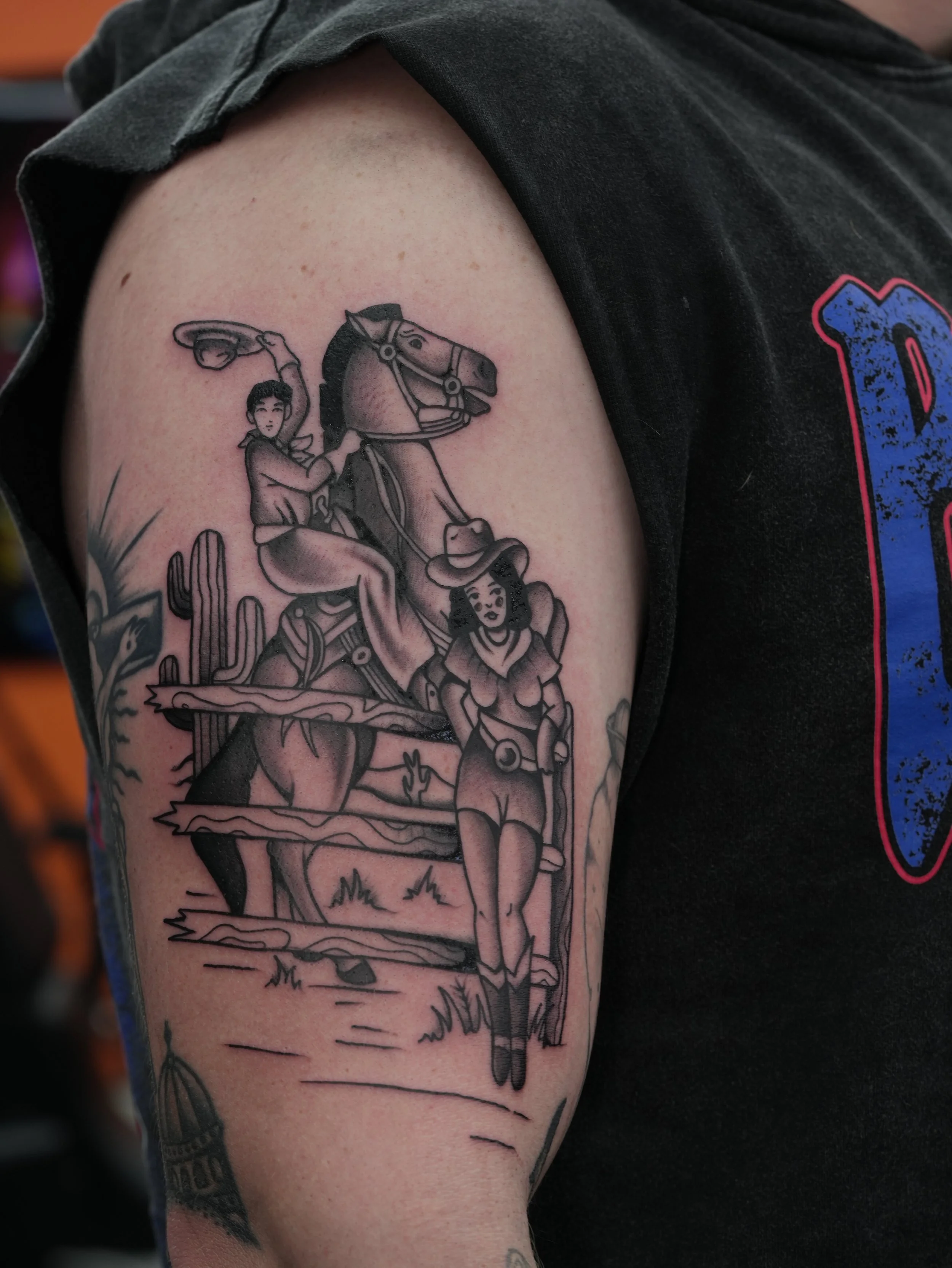 Traditional cowboy tattoo by flow kappa, tattoo artist in West Palm Beach. Traditional black and grey tattoo.