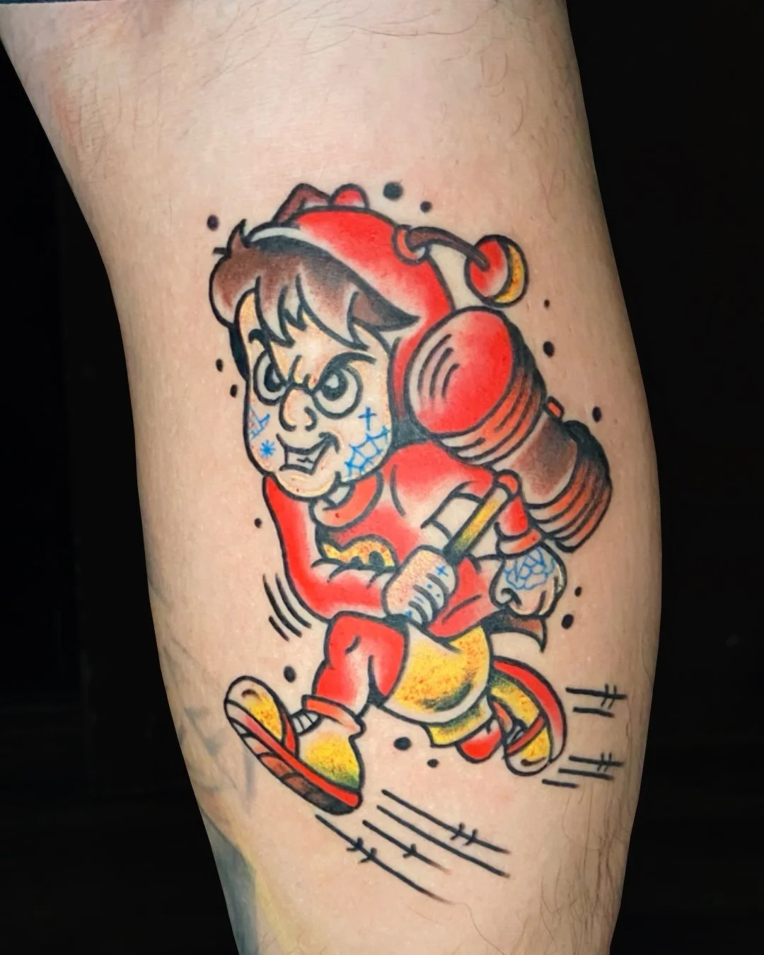 American Traditional style Chapulin Colorado tattoo in West Palm Beach, Florida, inspired by the iconic Mexican pop culture character. This tattoo blends bold outlines, solid color saturation, and classic tattoo principles with a playful and nostalgi