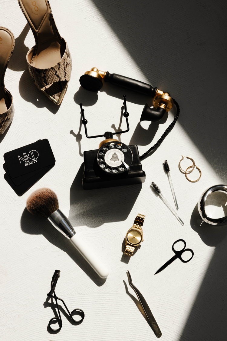 Beauty accessories flat lay in sunlight