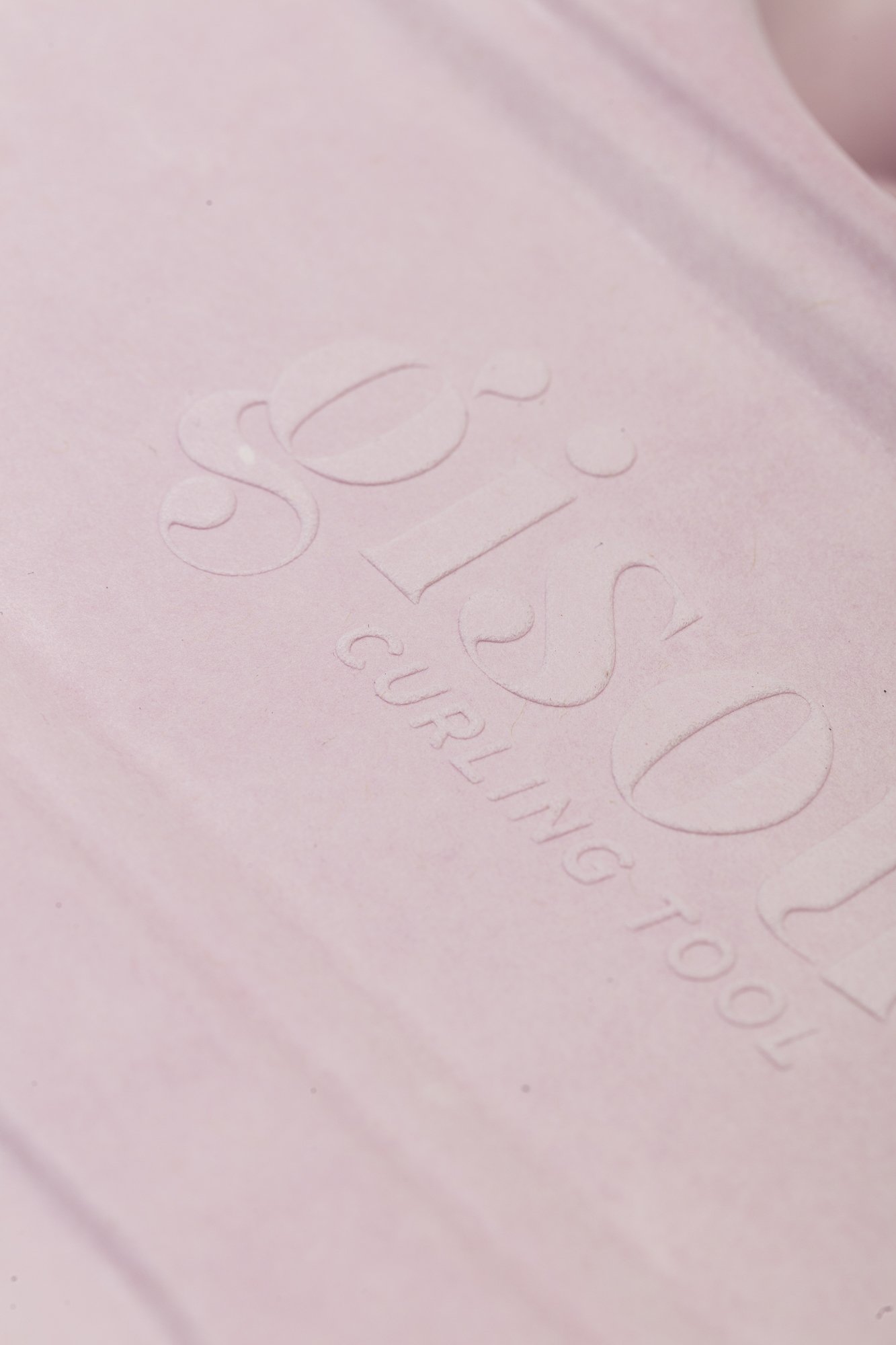Embossed Gisou logo close-up.jpg