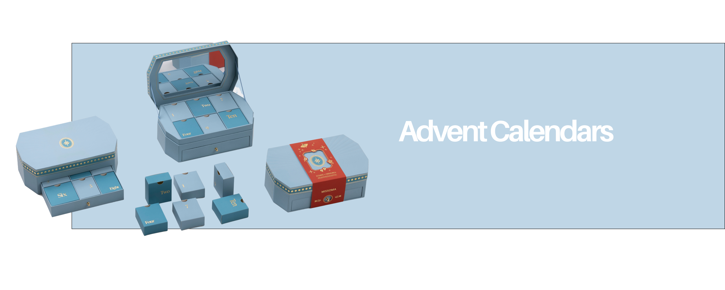 Blue advent calendar shaped like a box, with numbered doors for each day, decorated with red and gold accents, labeled for the holiday season.