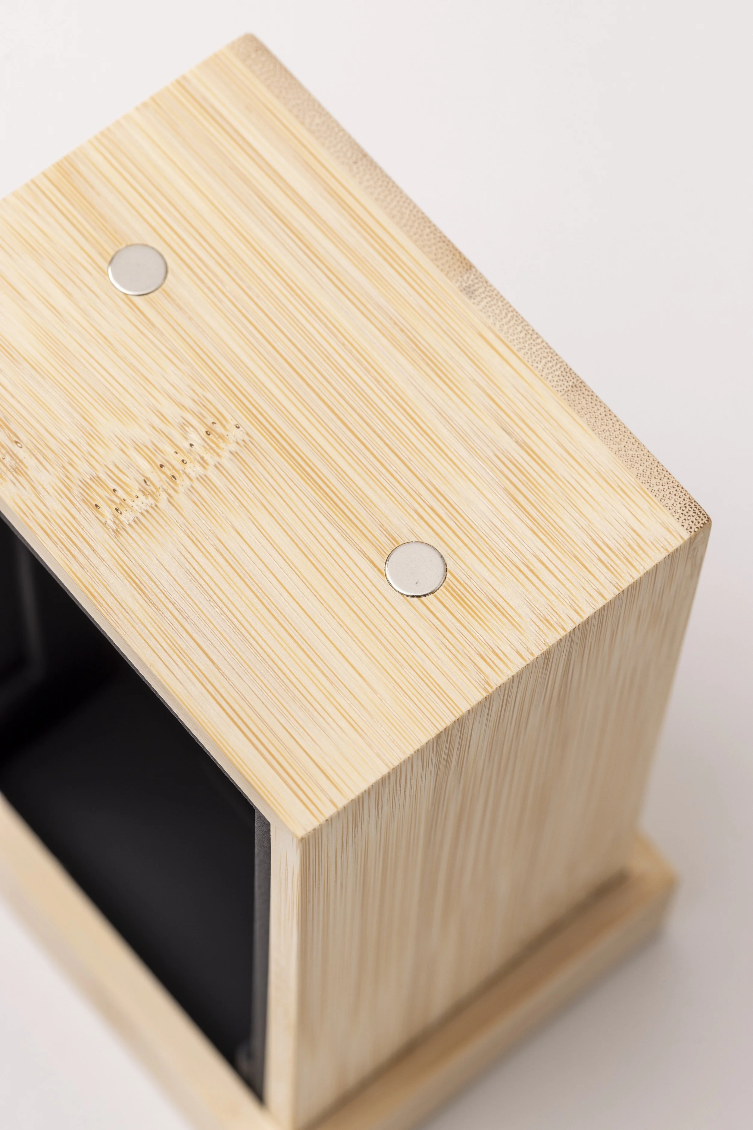 Close up of a bamboo watch box made for Christopher Ward
