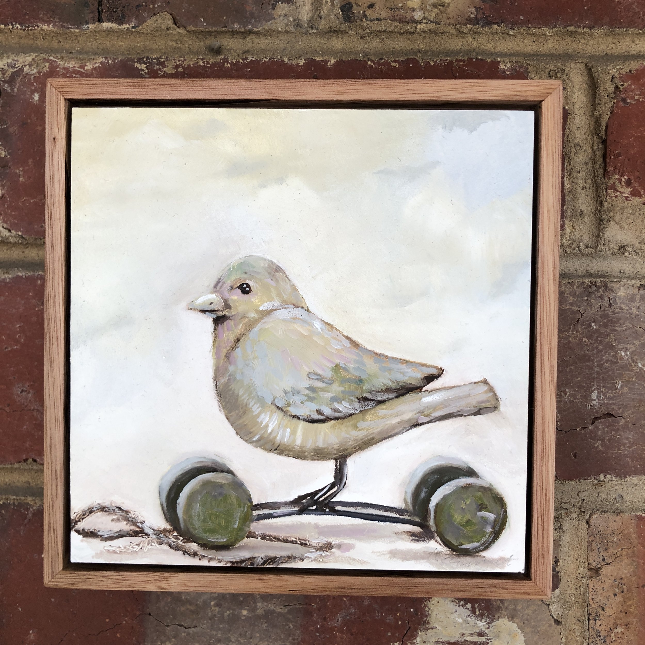 Bird on wheels 2.JPG
