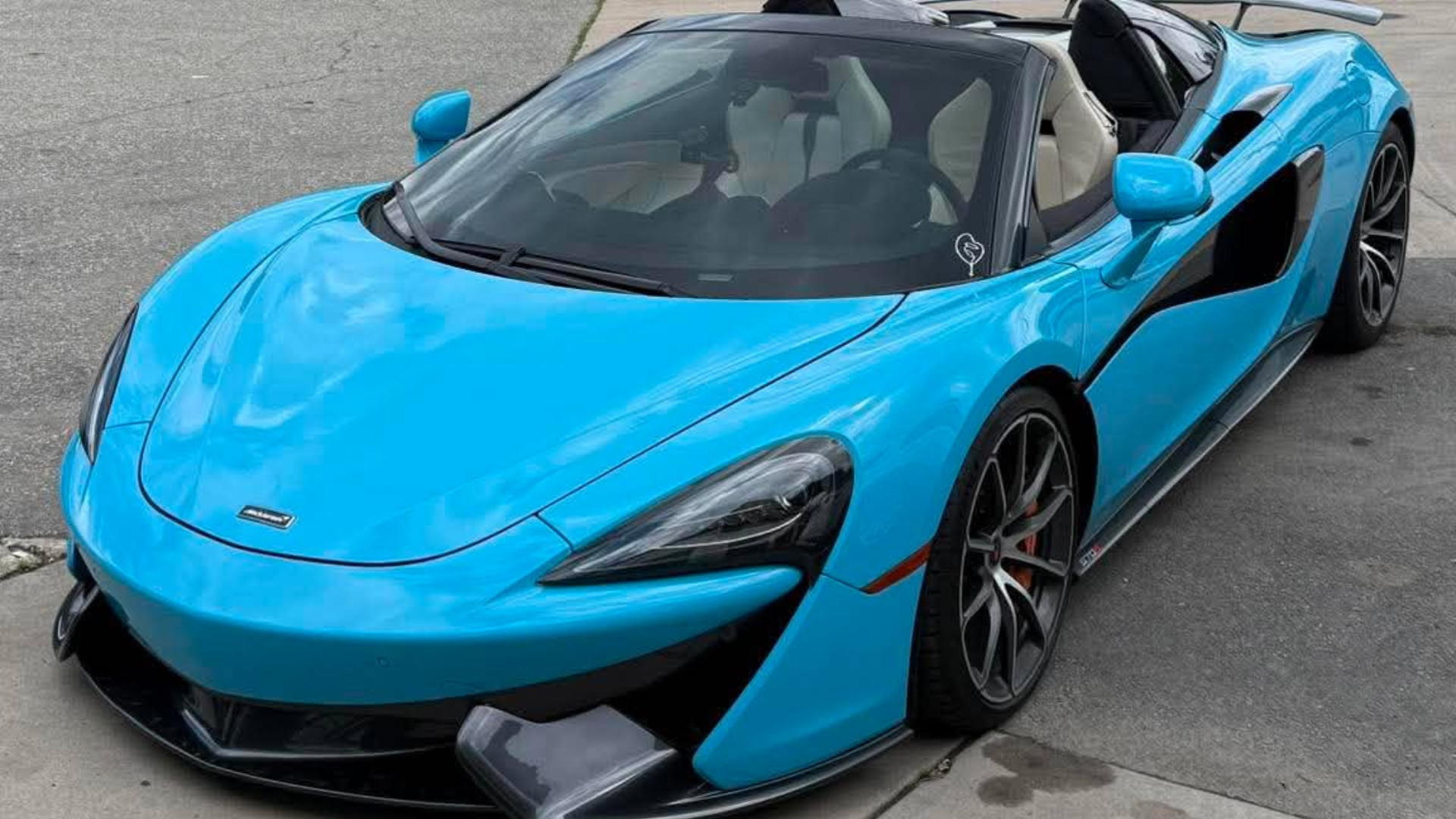Professional McLaren leather seat restoration in Boston, MA. Luxury sports car interior repair with custom leather refinishing and color matching.