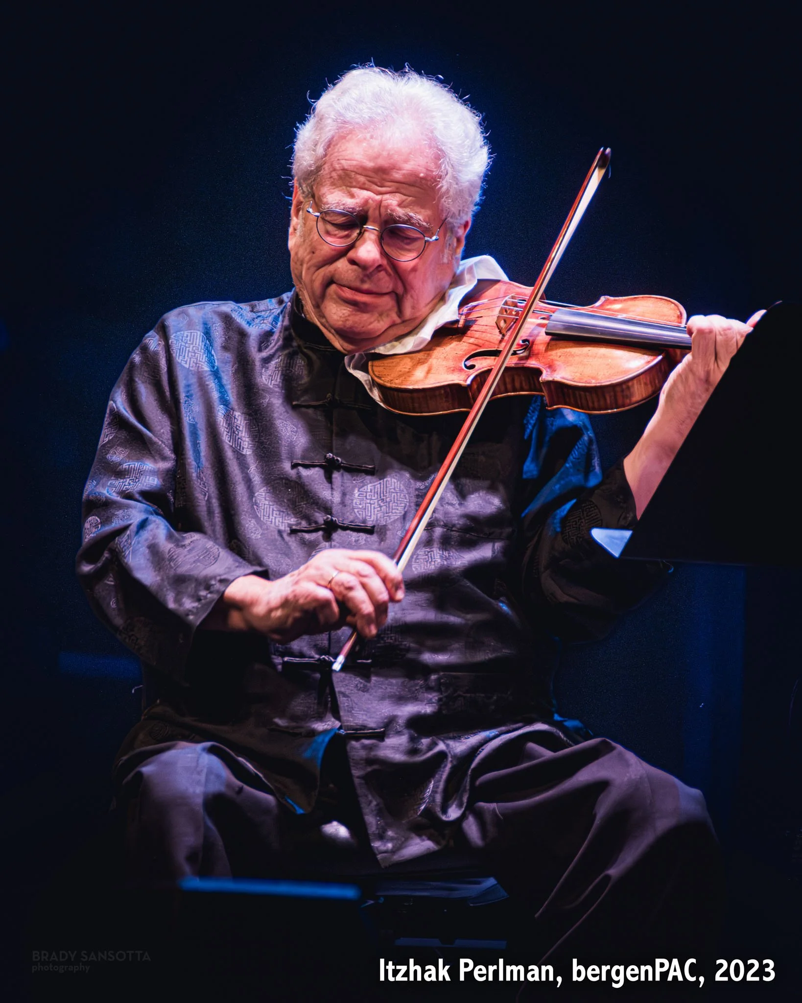 Close-up portrait of legendary violinist Itzhak Perlman performing a classical solo at BergenPAC in Englewood, NJ.