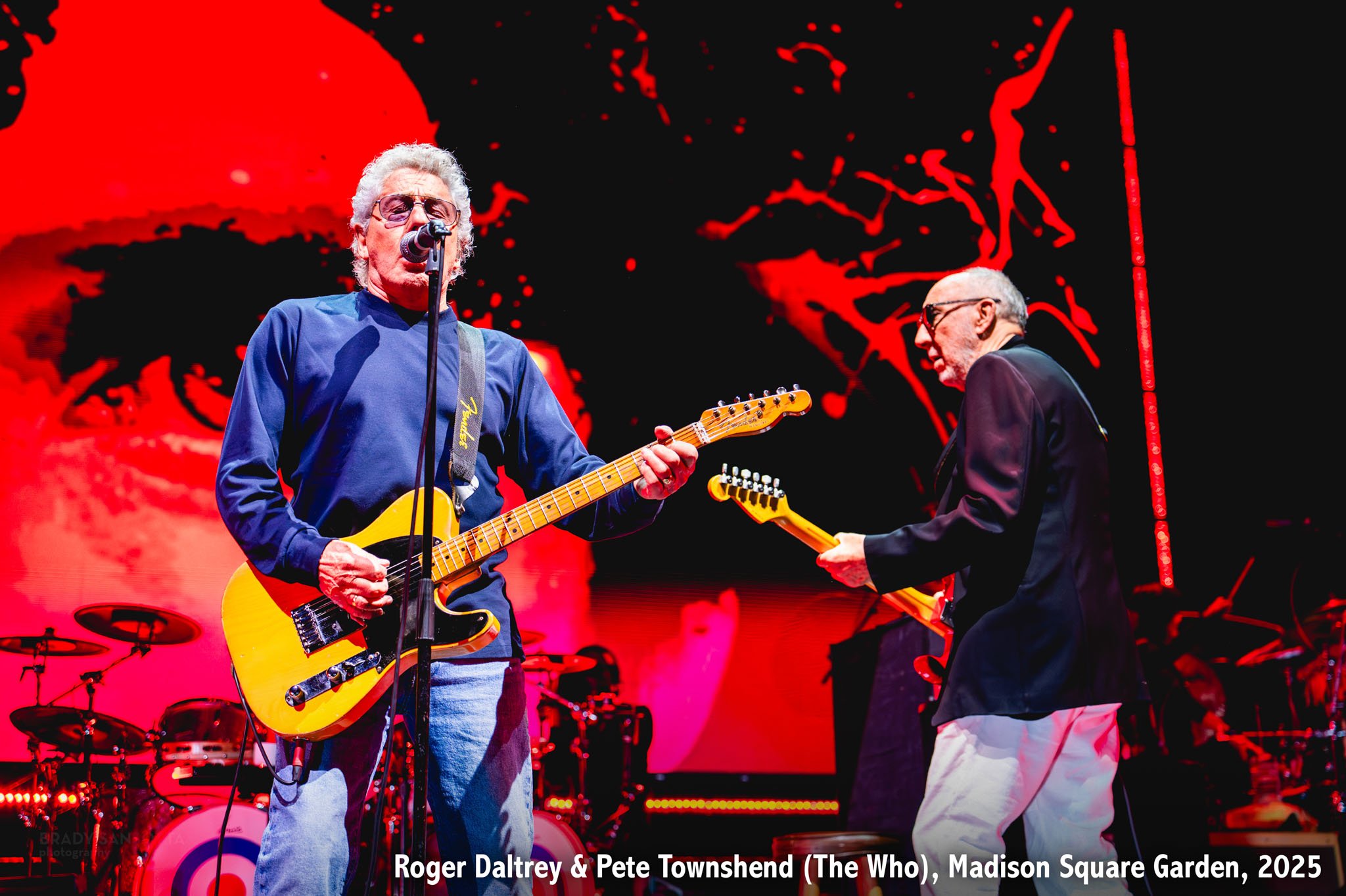 Roger Daltrey and Pete Townshend of The Who playing guitar side by side at Madison Square Garden concert 2025.