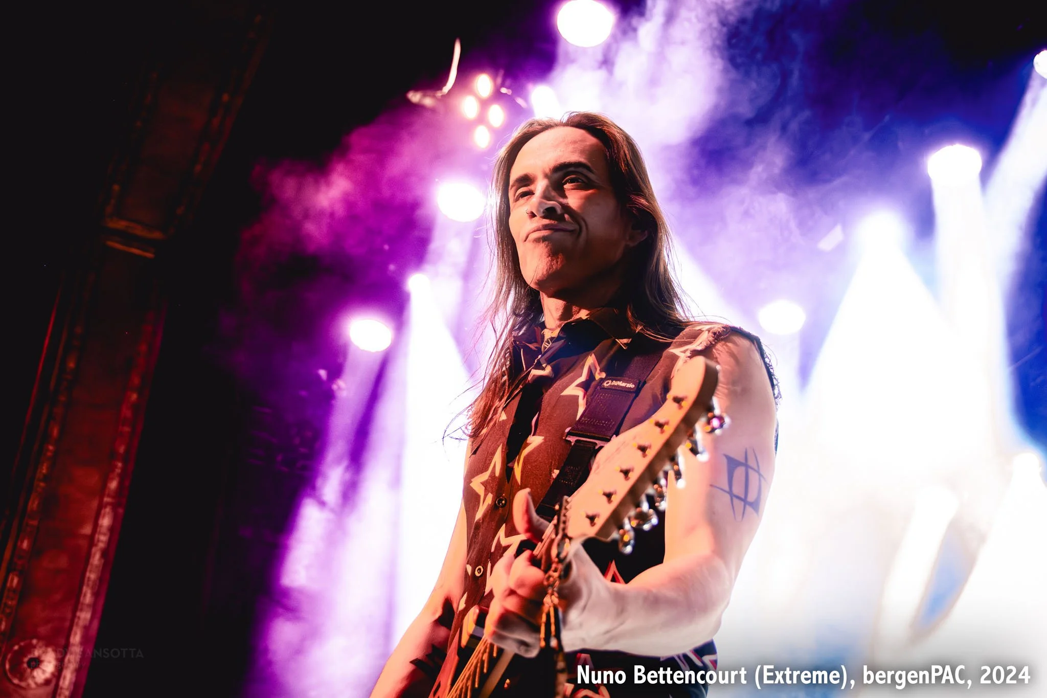 Nuno Bettencourt of Extreme playing guitar during a rock concert at BergenPAC in Englewood, NJ.