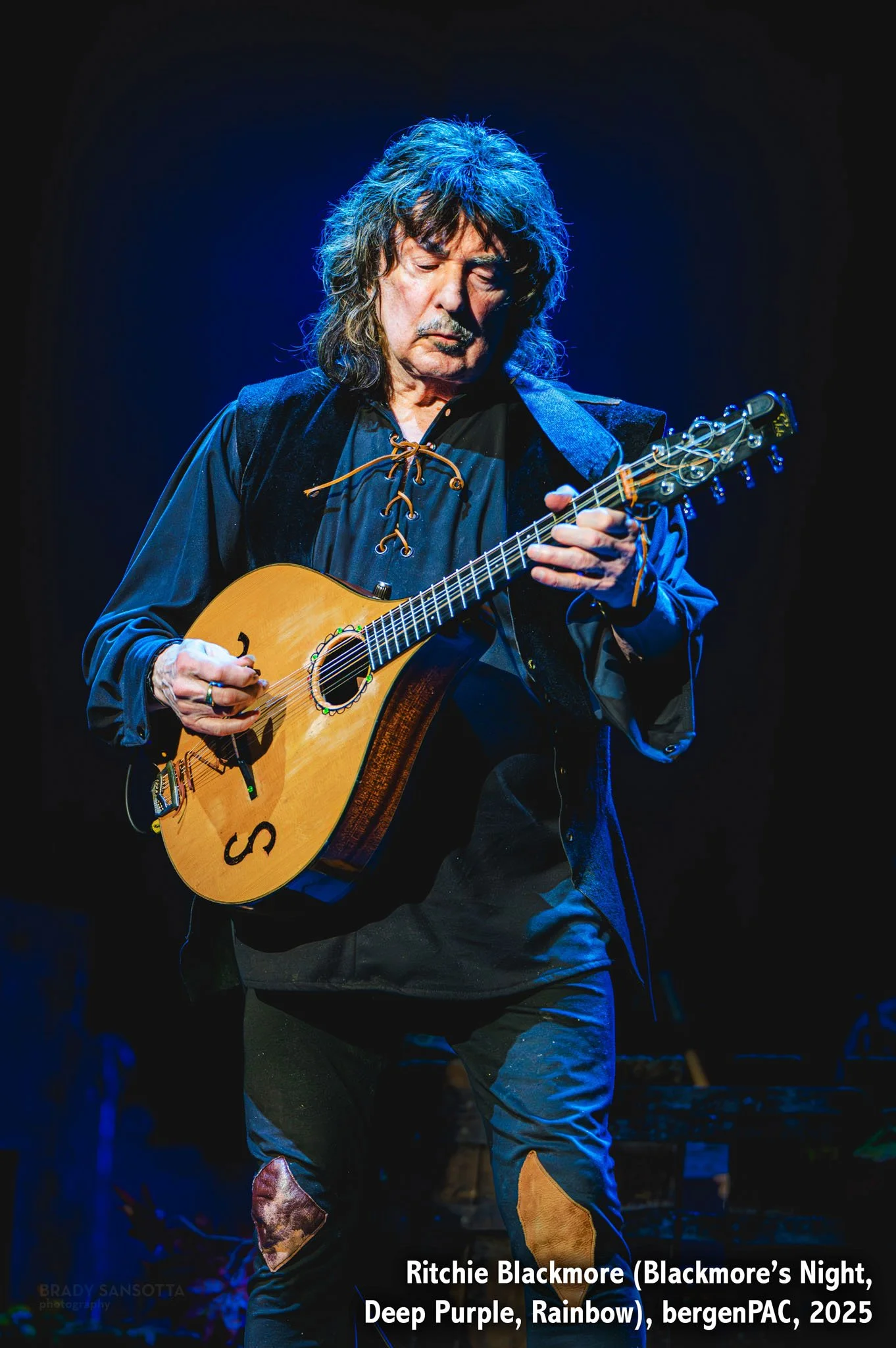 Black and white portrait of Ritchie Blackmore (of Deep Purple) during a Renaissance-inspired Blackmore’s Night concert at BergenPAC..