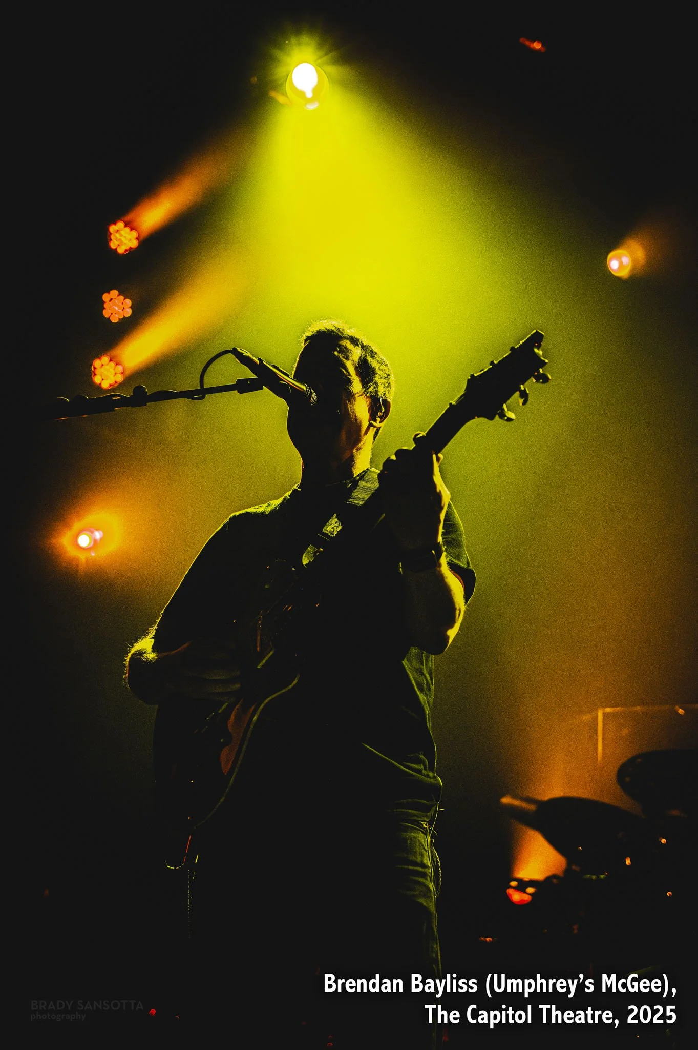 Silhouetted portrait of Umphrey’s McGee guitarist and vocalist Brendan Bayliss at Capitol Theatre in Port Chester, NY.