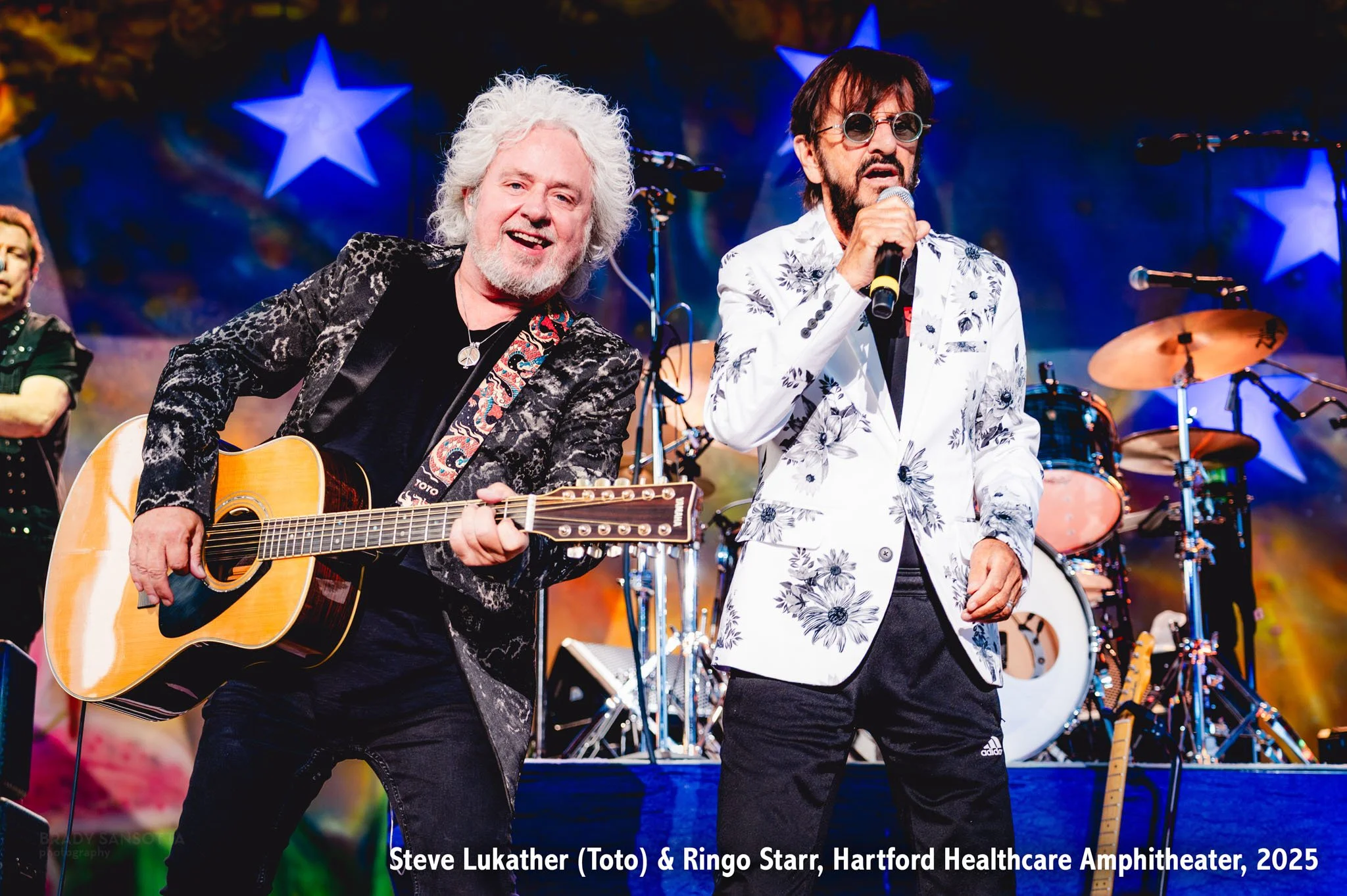 Steve Lukather (of Toto) and Ringo Starr perform live at rock concert in Bridgeport, Connecticut.
