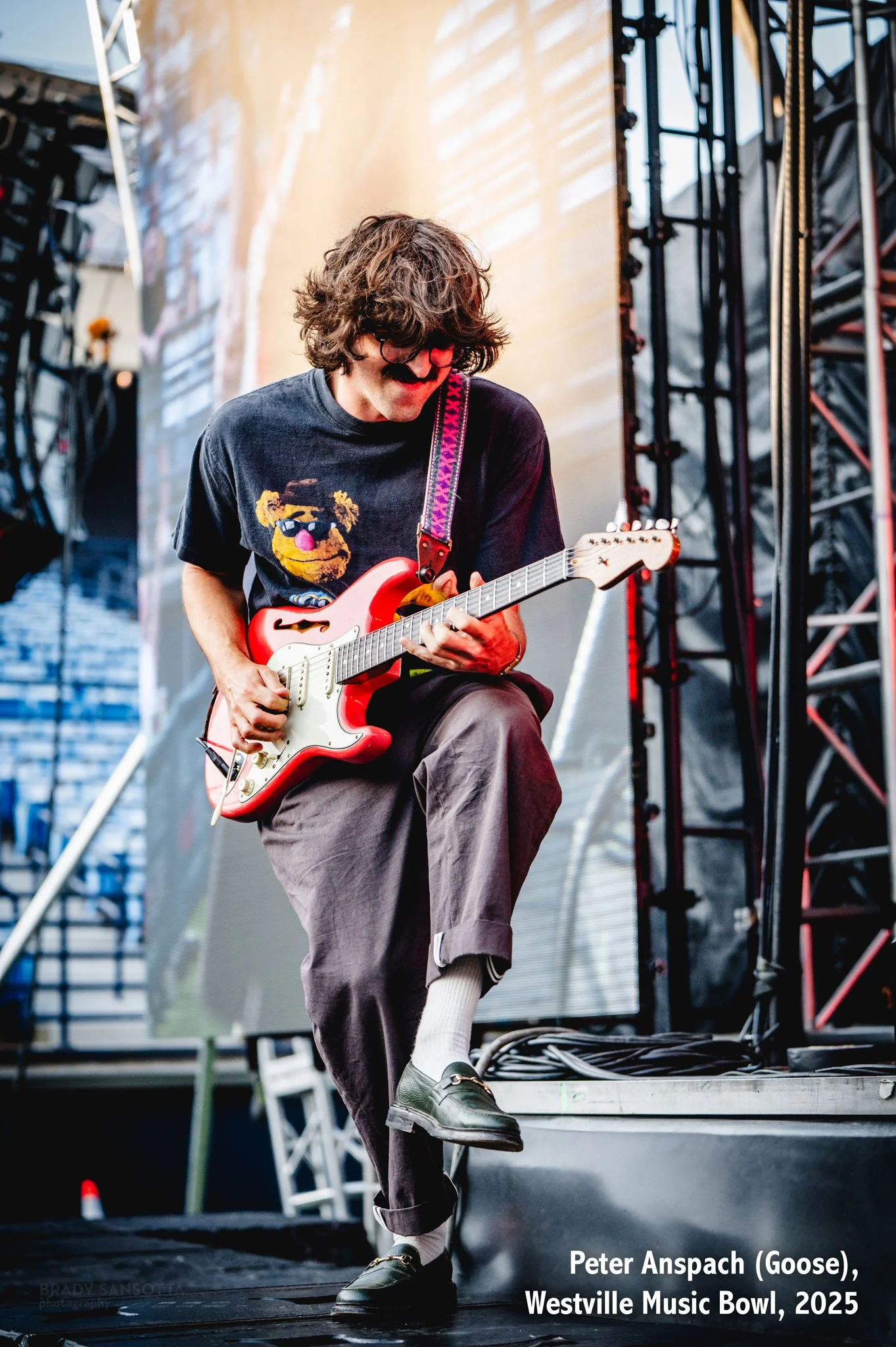 Peter Anspach playing guitar on stage with jam rock band Goose at Westville Music Bowl in New Haven, Connecticut