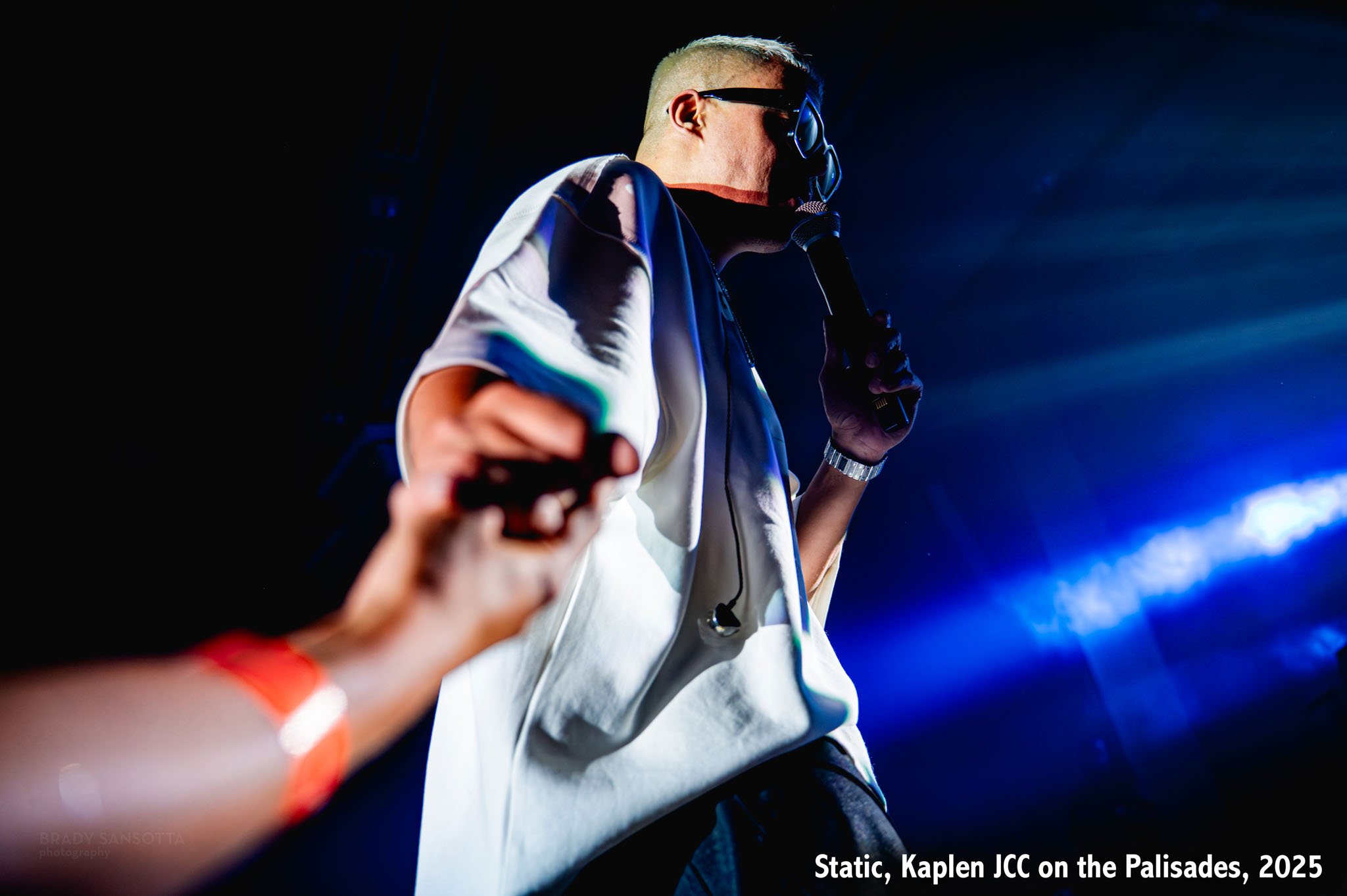 Israeli pop star Static (Liraz Russo) interacting with fan during live Kaplen JCC OTP concert in NJ.