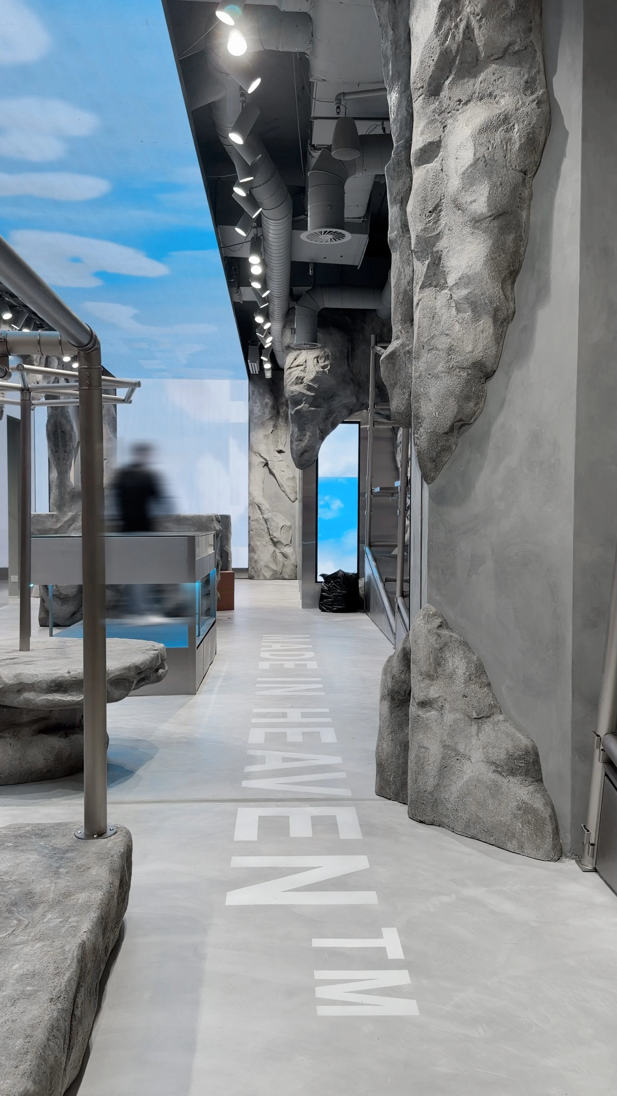 realism concept store featuring microcement floor