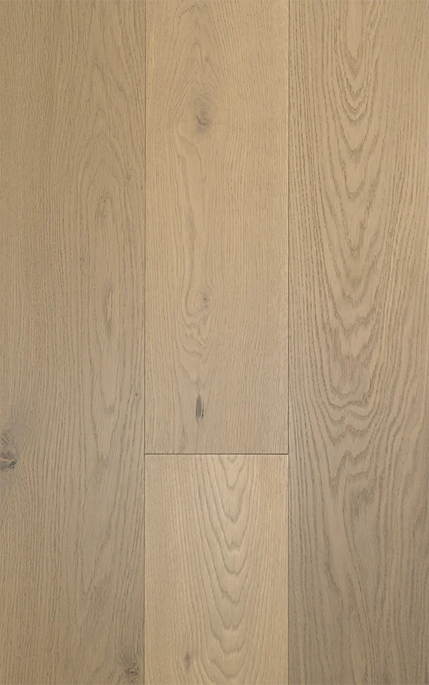 Close-up of a light-colored wooden floor with visible grain and knots.