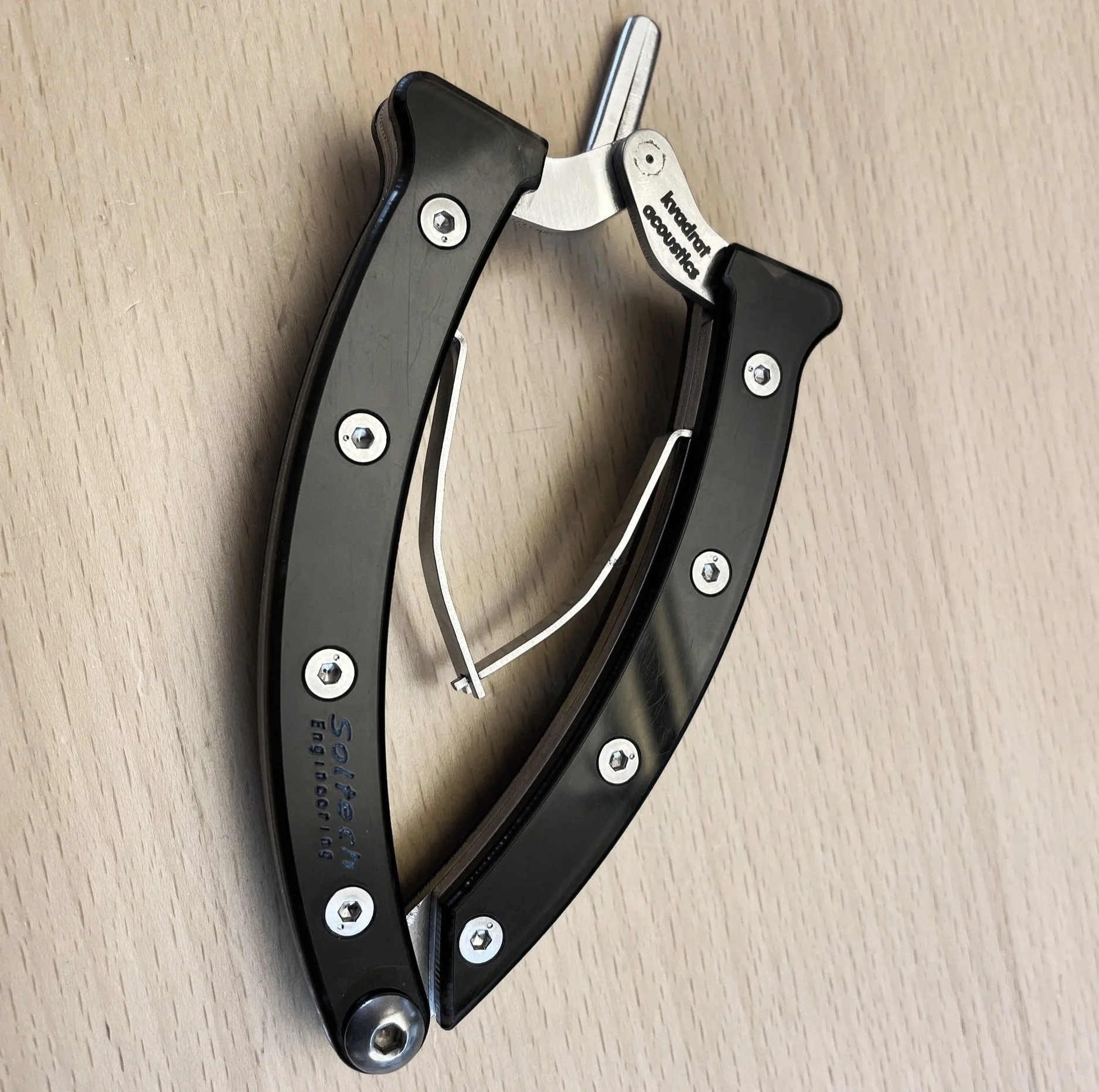 A black and silver custom made tool