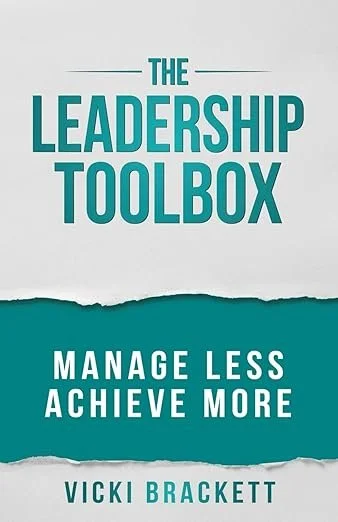 Book cover titled 'The Leadership Toolbox' by Vicki Brackett with the tagline 'Manage Less Achieve More' in teal and white design.