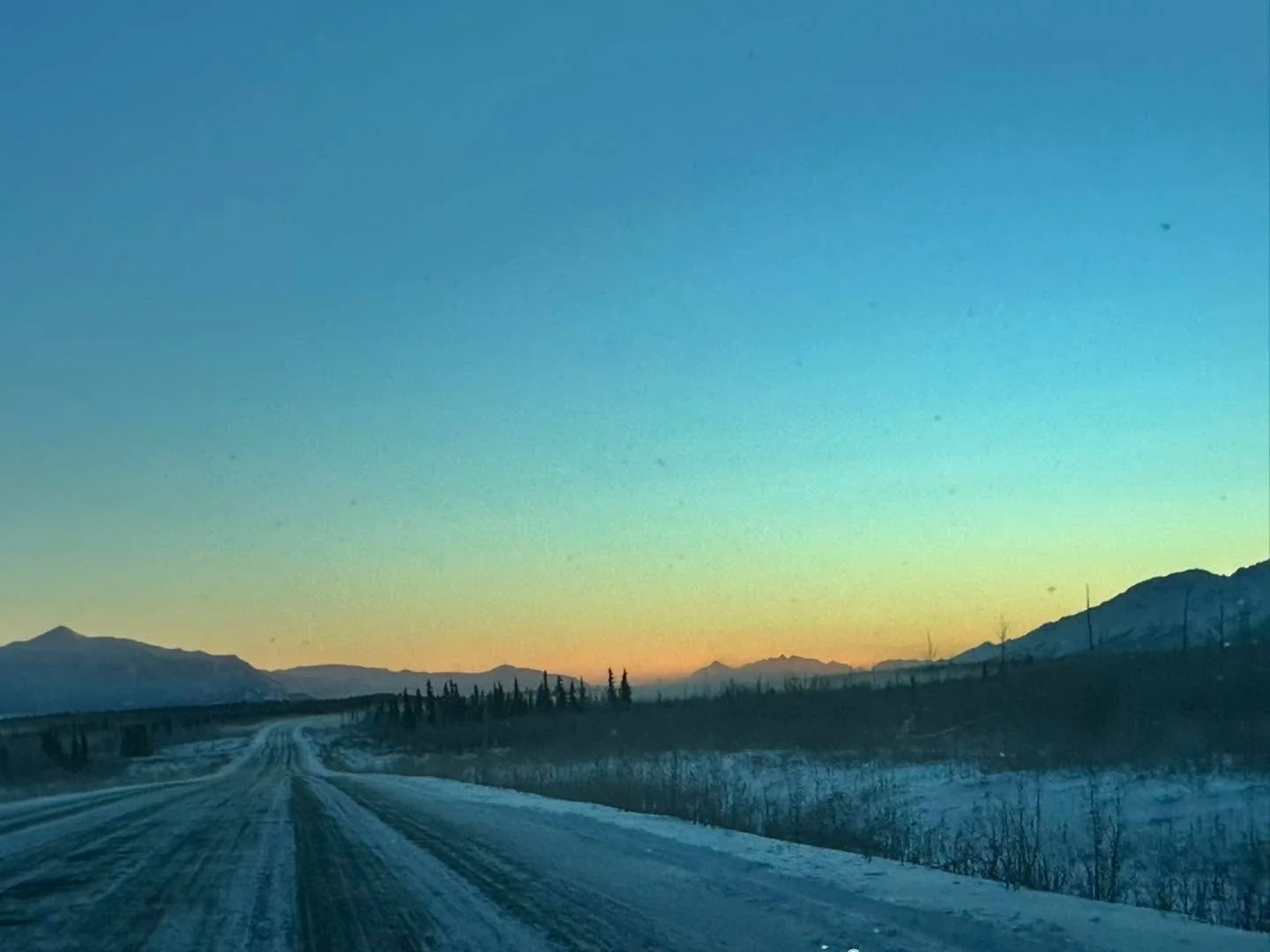 11:42am. Sun is trying to rise above the mountains. These last few days before the winter solstice are always my favourite. The light is exquisite.  #yukon #independentartist #wintersolstice