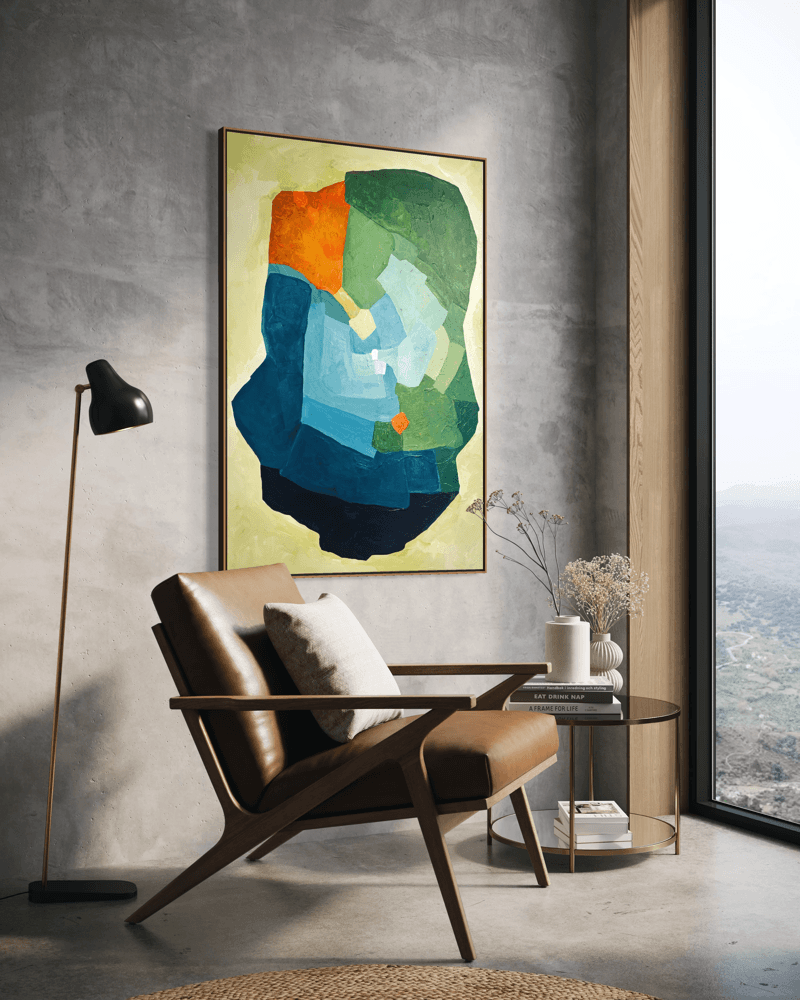 Balancing Friction – original, abstract artwork by Birgit Trofer, painting from the collection „Lifescapes“ – inner landscapes. Contemporary artwork exploring the dynamic tension in blue, green and vibrant orange accents, mounted on a wall in a cozy 